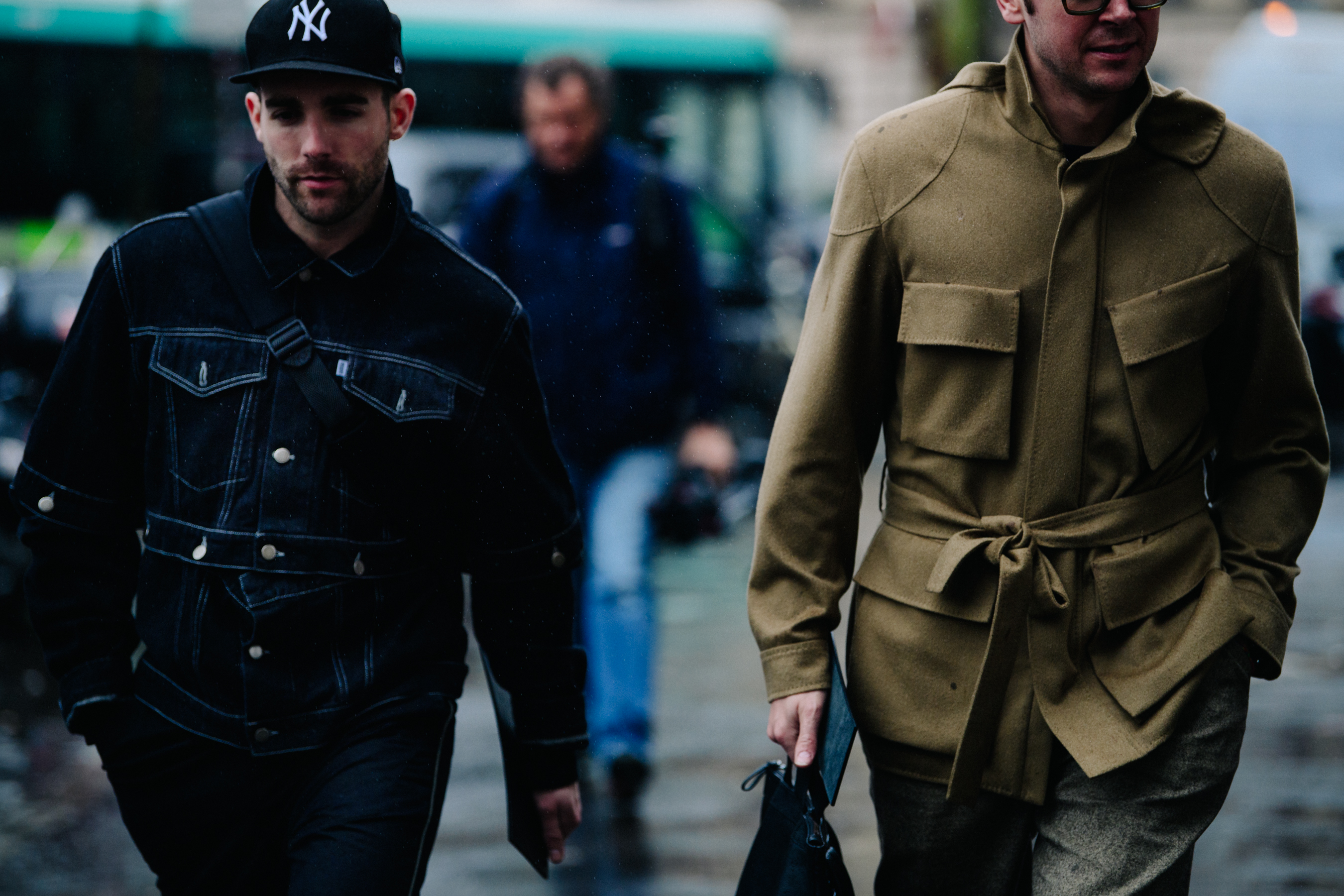 Two men wearing jackets with chest pockets