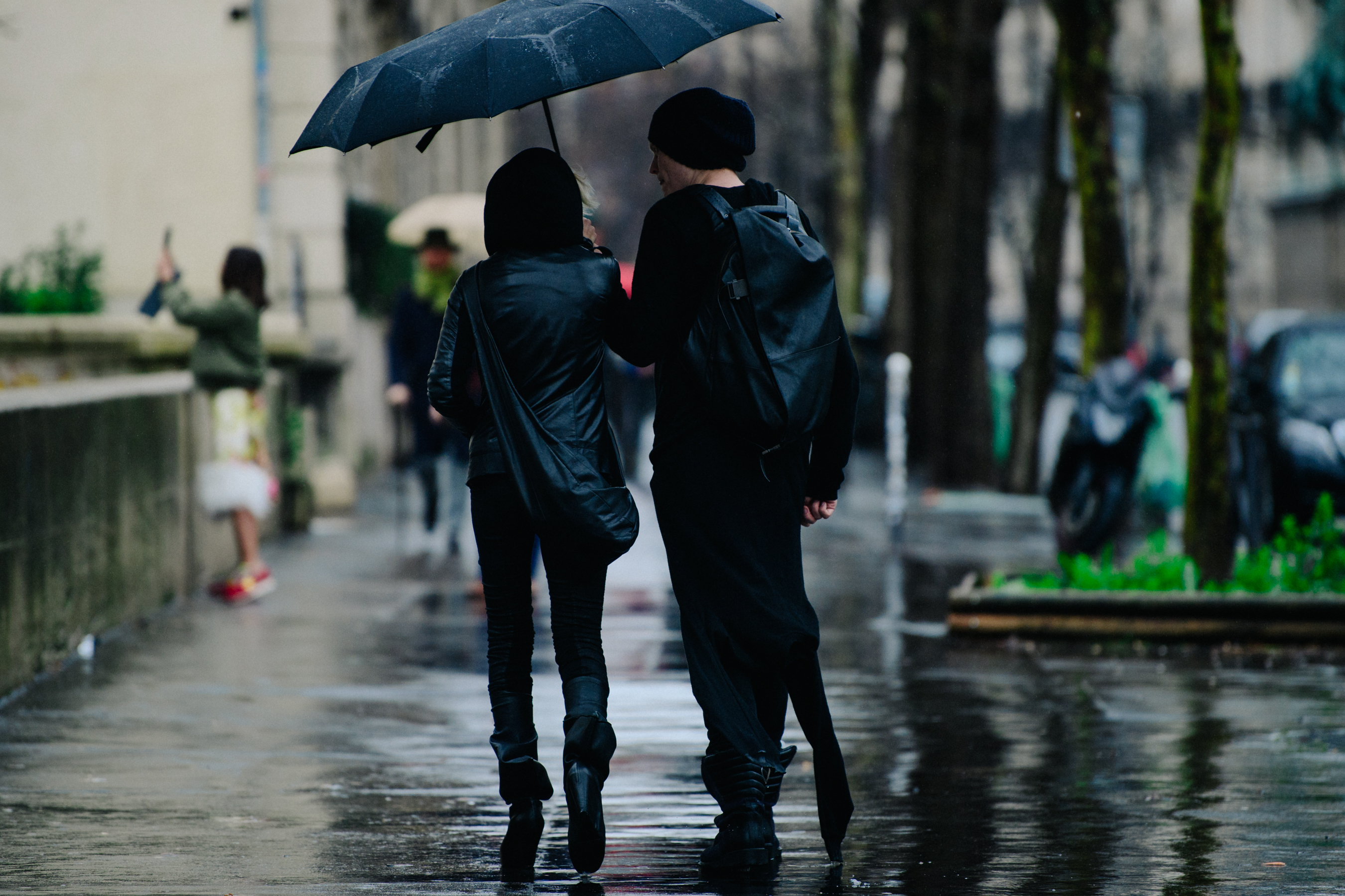 Couple wearing full leather outfits
