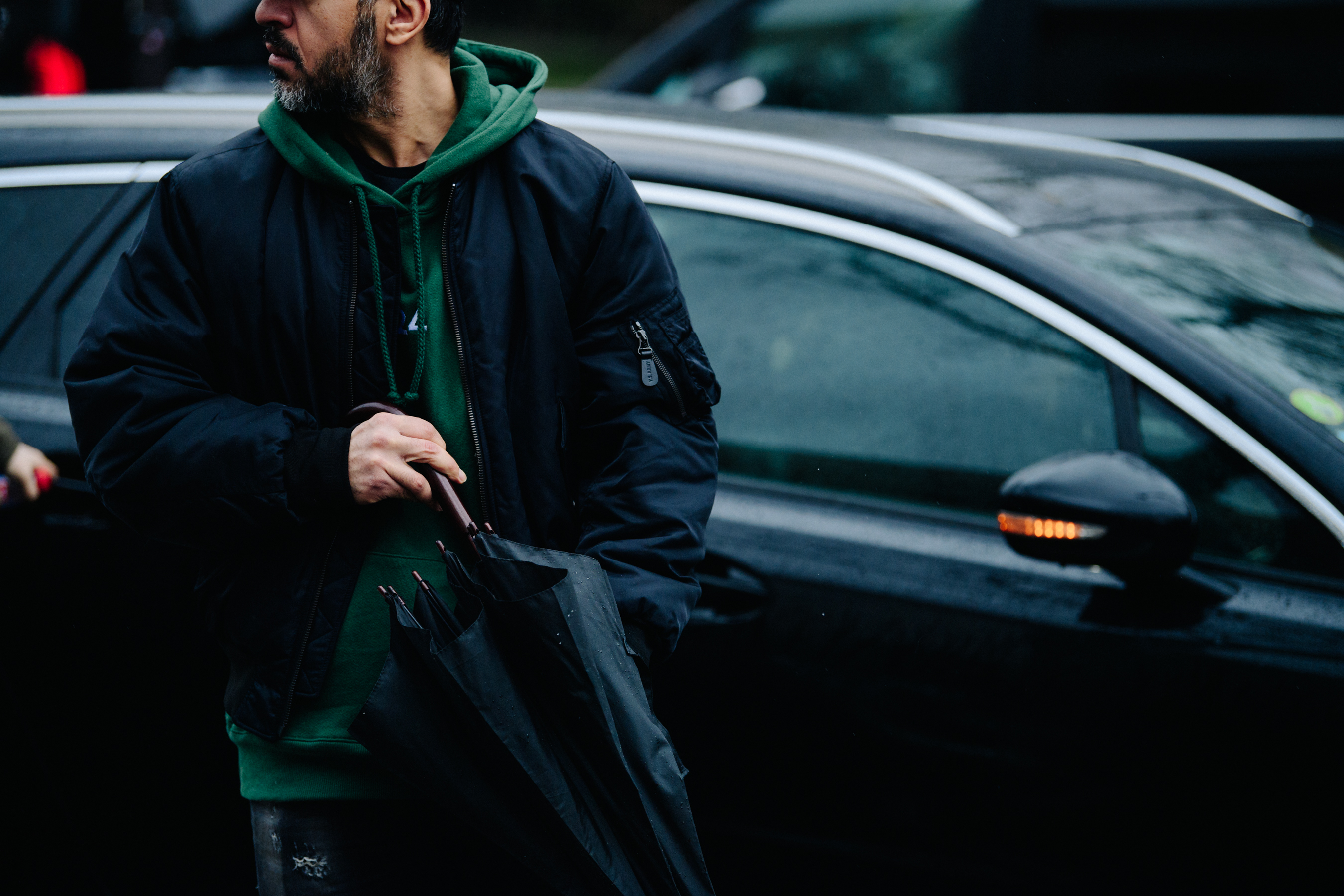 Man wearing green 424 hoodie