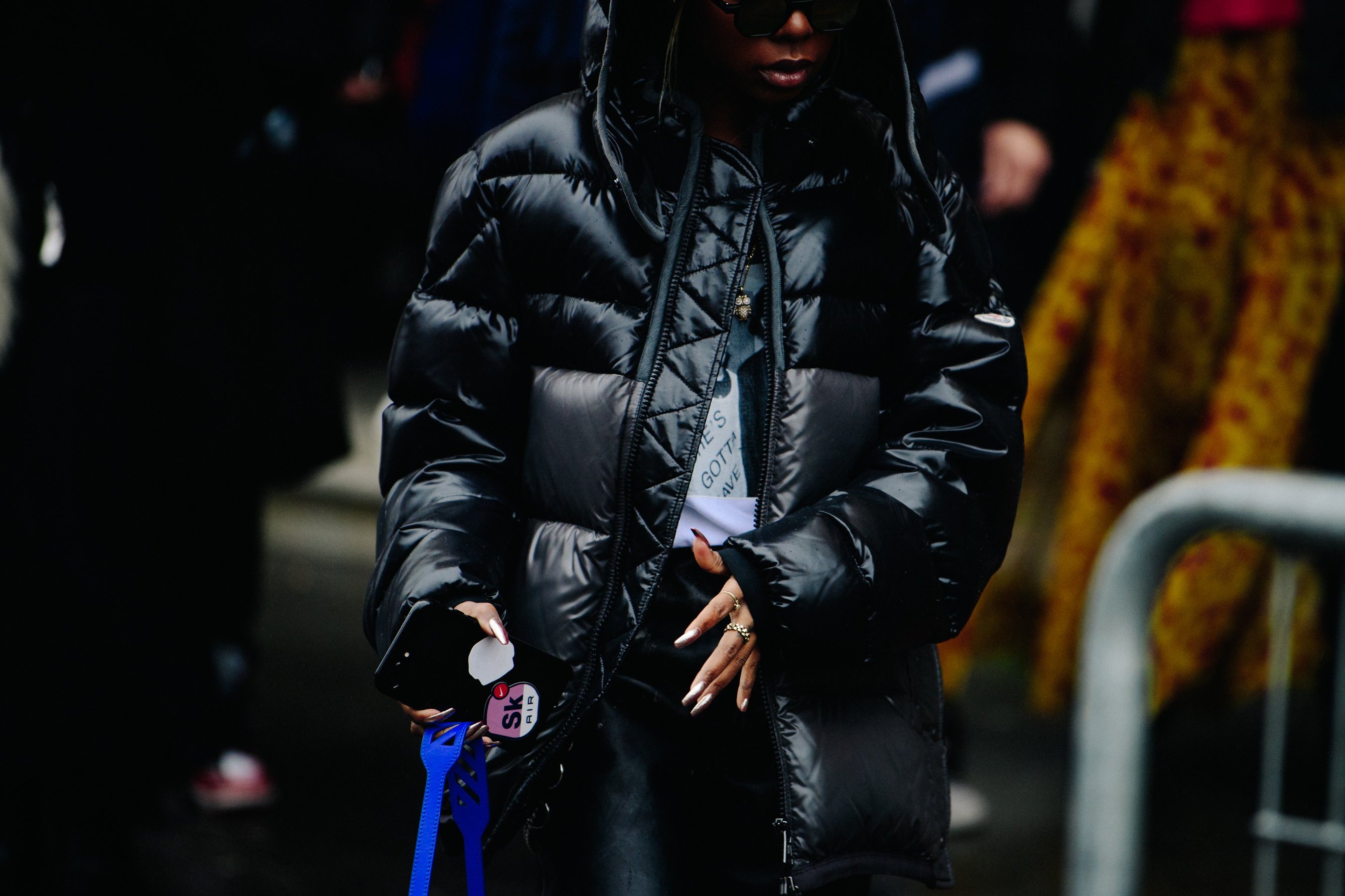 Woman wearing black puffer coat
