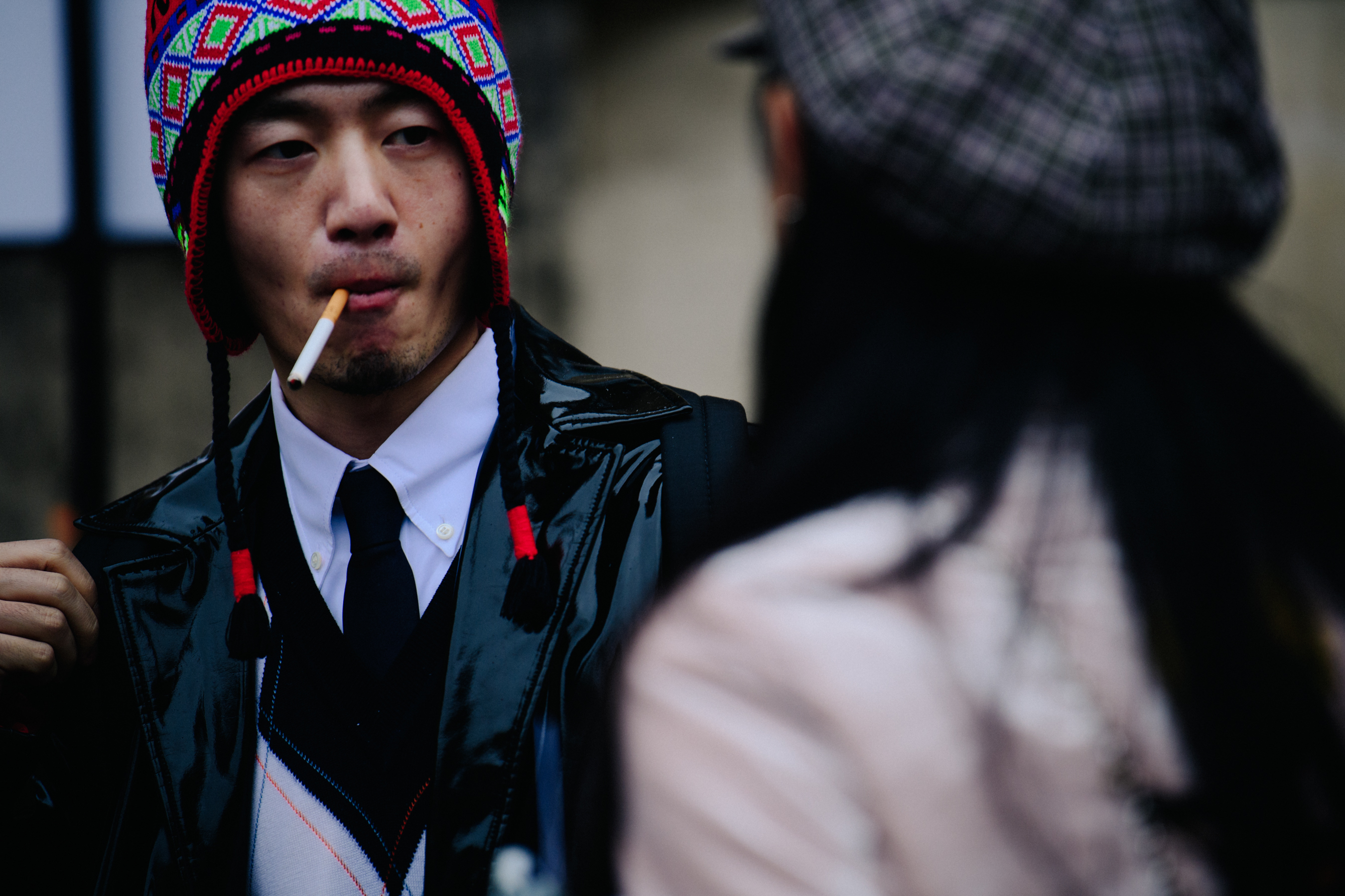 Man wearing bright coloured beanie