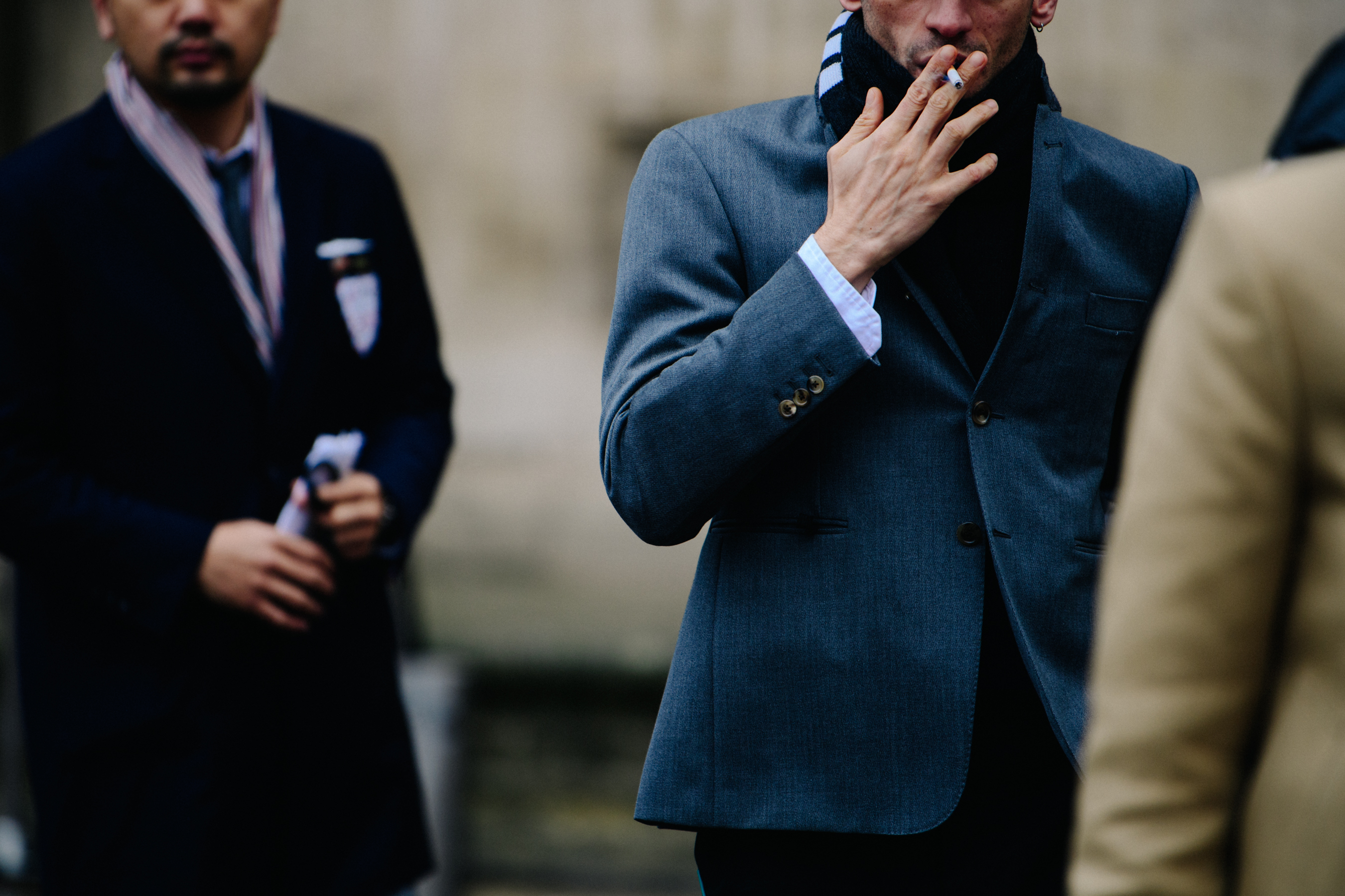 Man wearing grey suit jacket