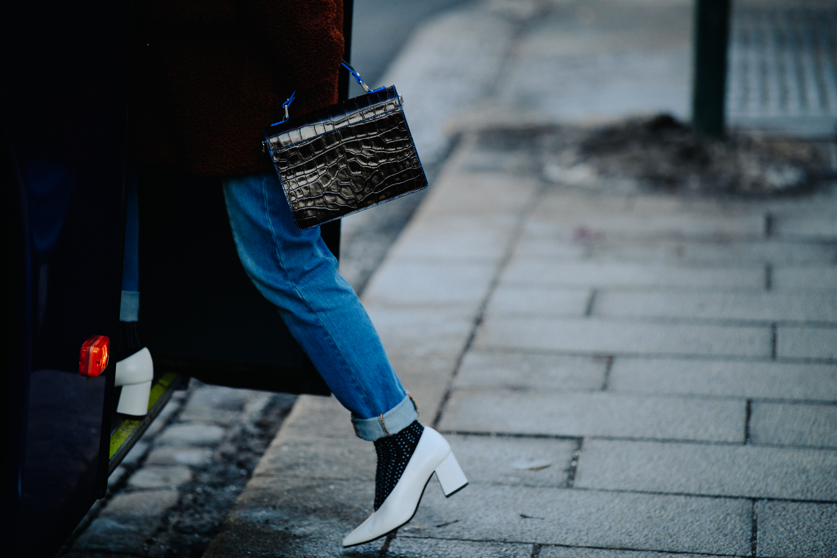 Woman wearing white heel shoes