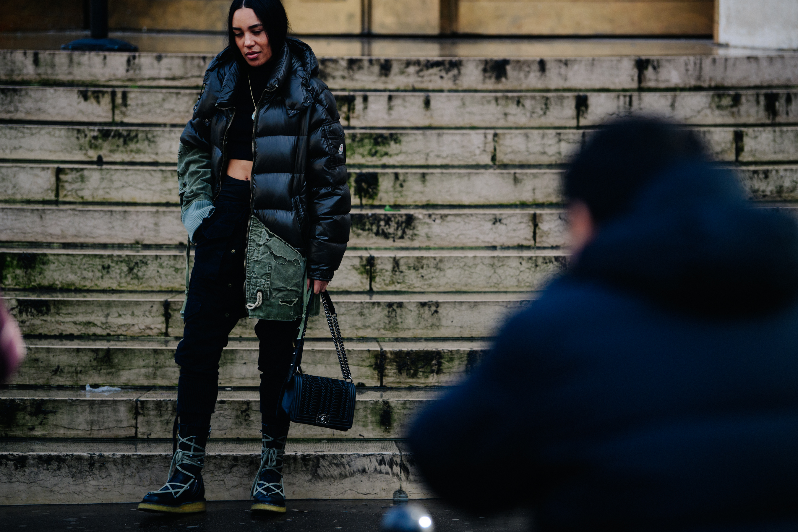 American woman weaing Moncler coat