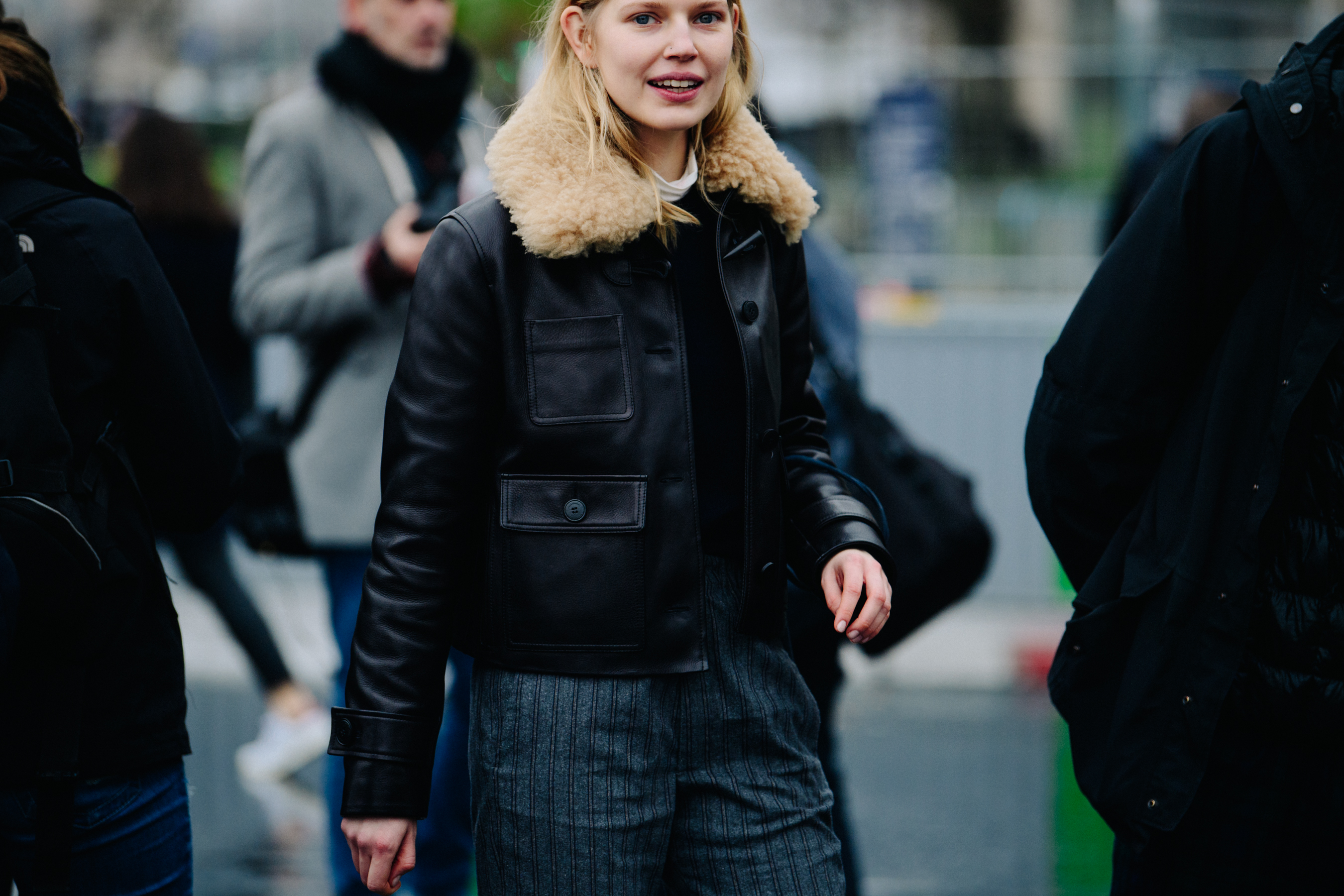 Model wearing black shearling jacket