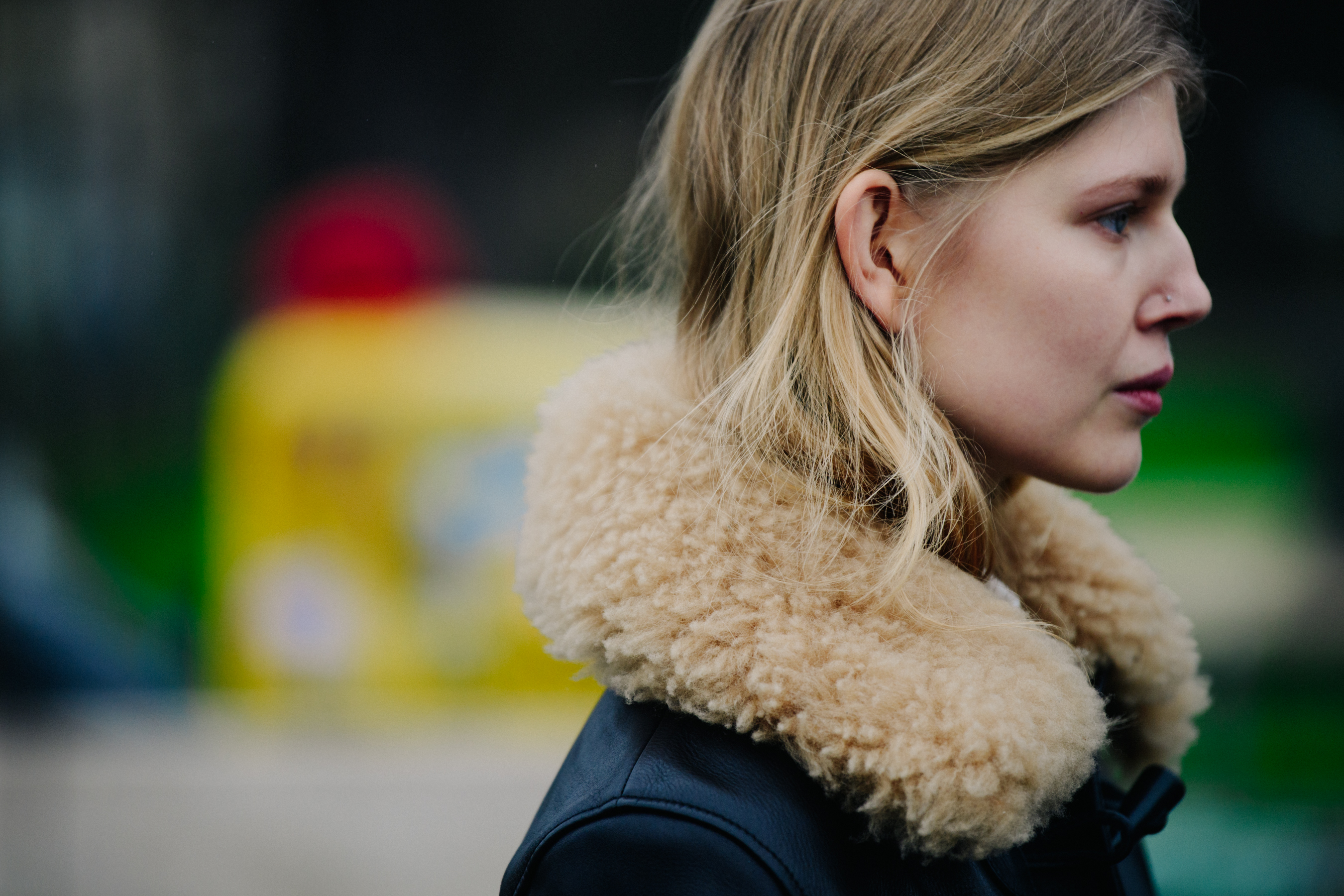 Model wearing black shearling jacket