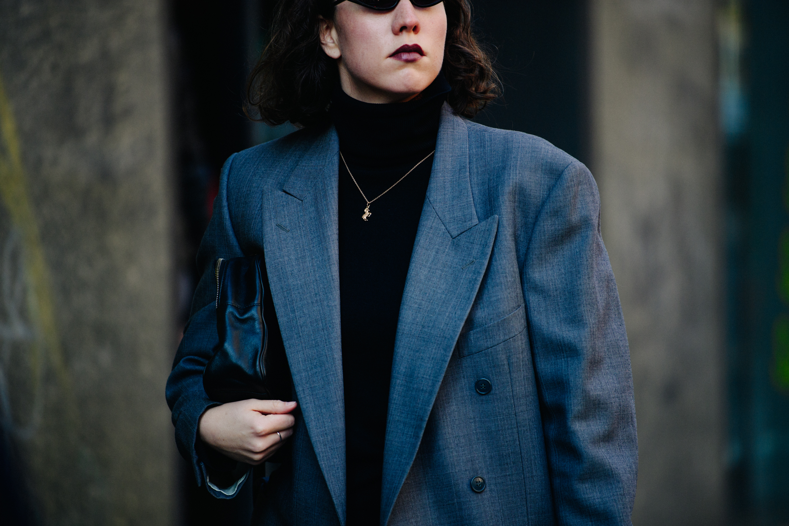 Russian woman wearing grey suit jacket