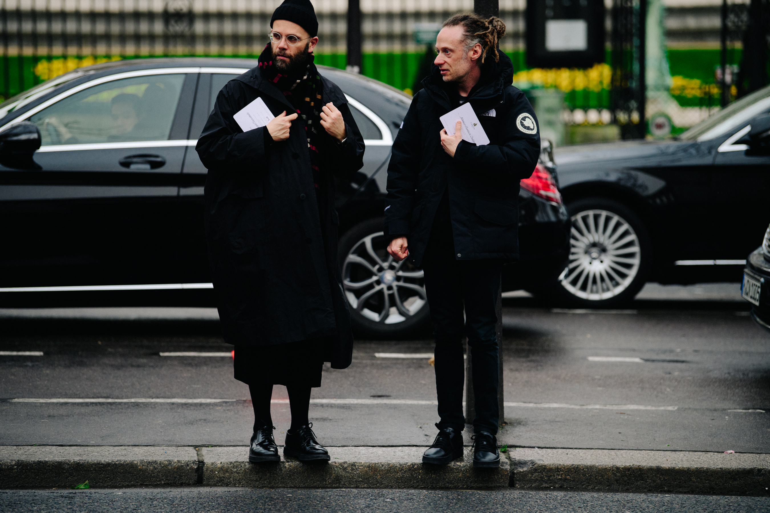 Two Italian men wearing all black