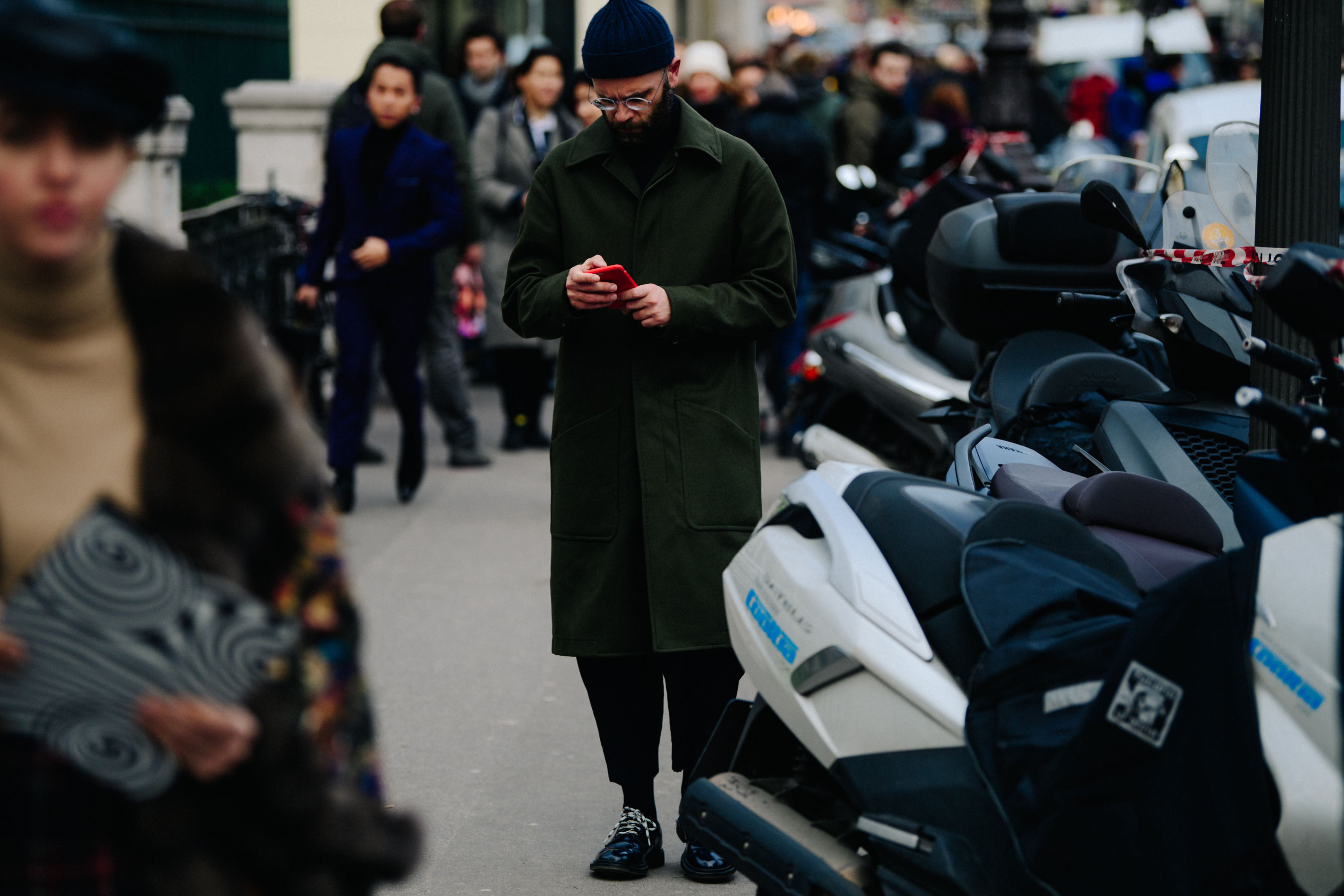 Italian man wearing blue beanie after show