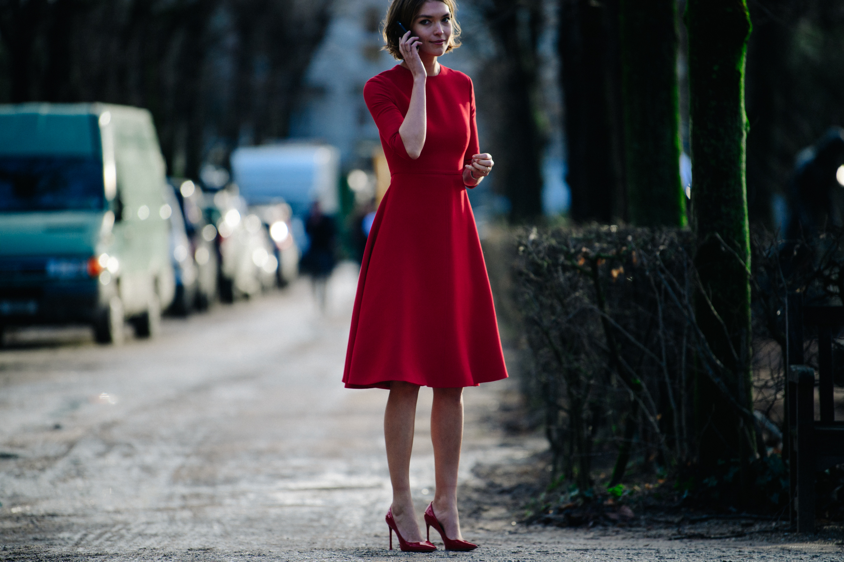 American model wearing red dress