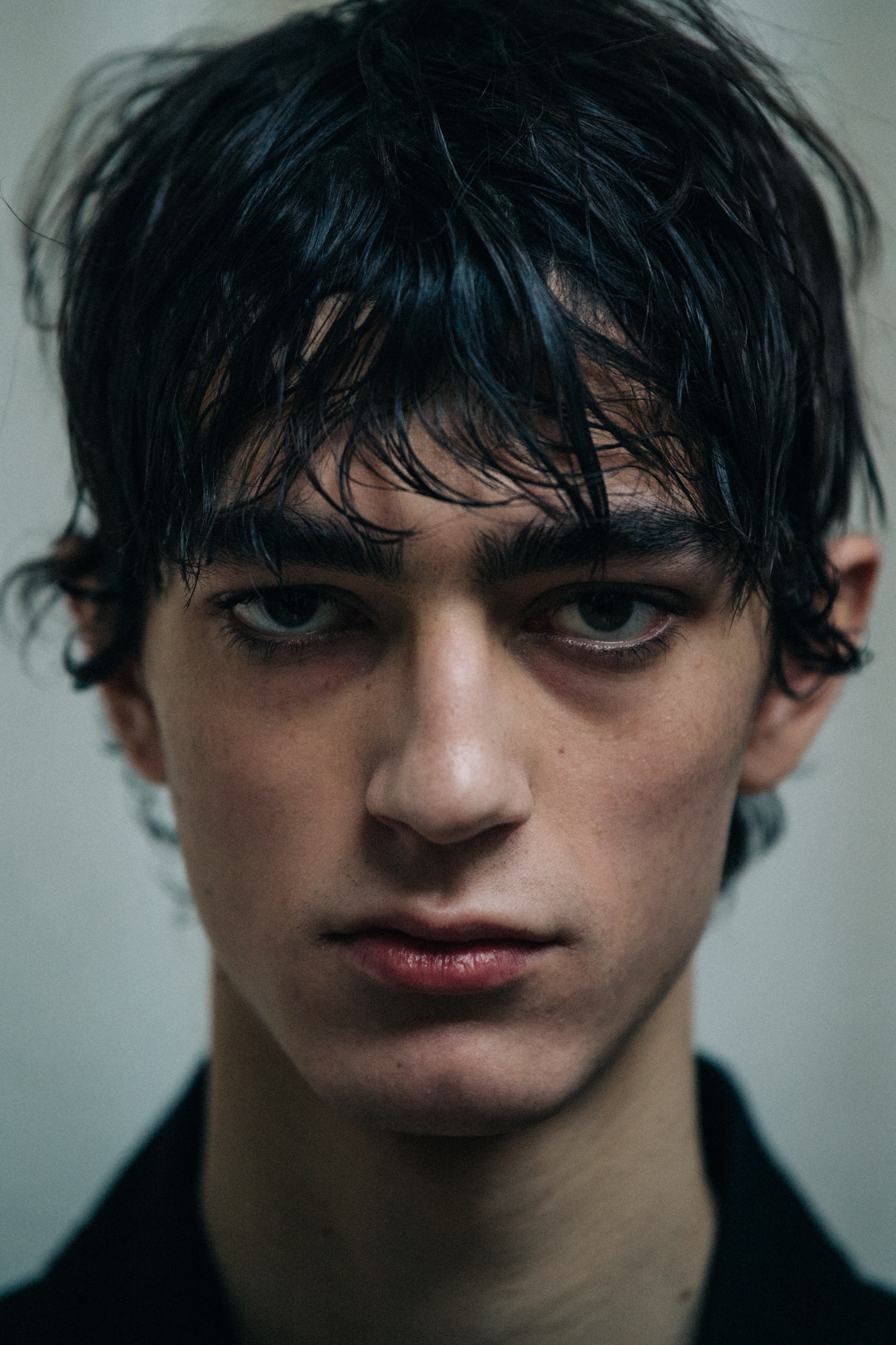 Portrait of model with messy black hair