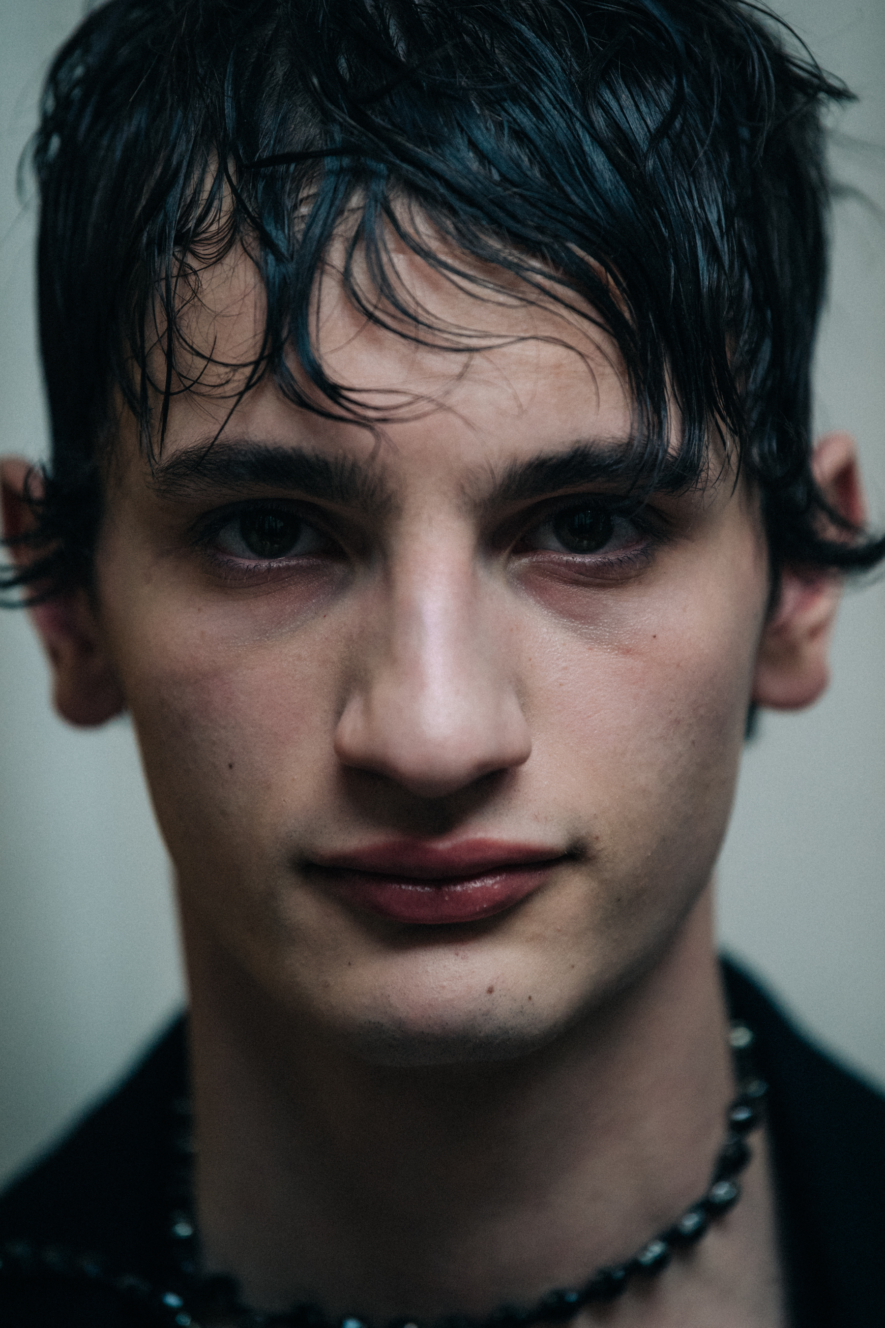 Portrait of model with messy black hair