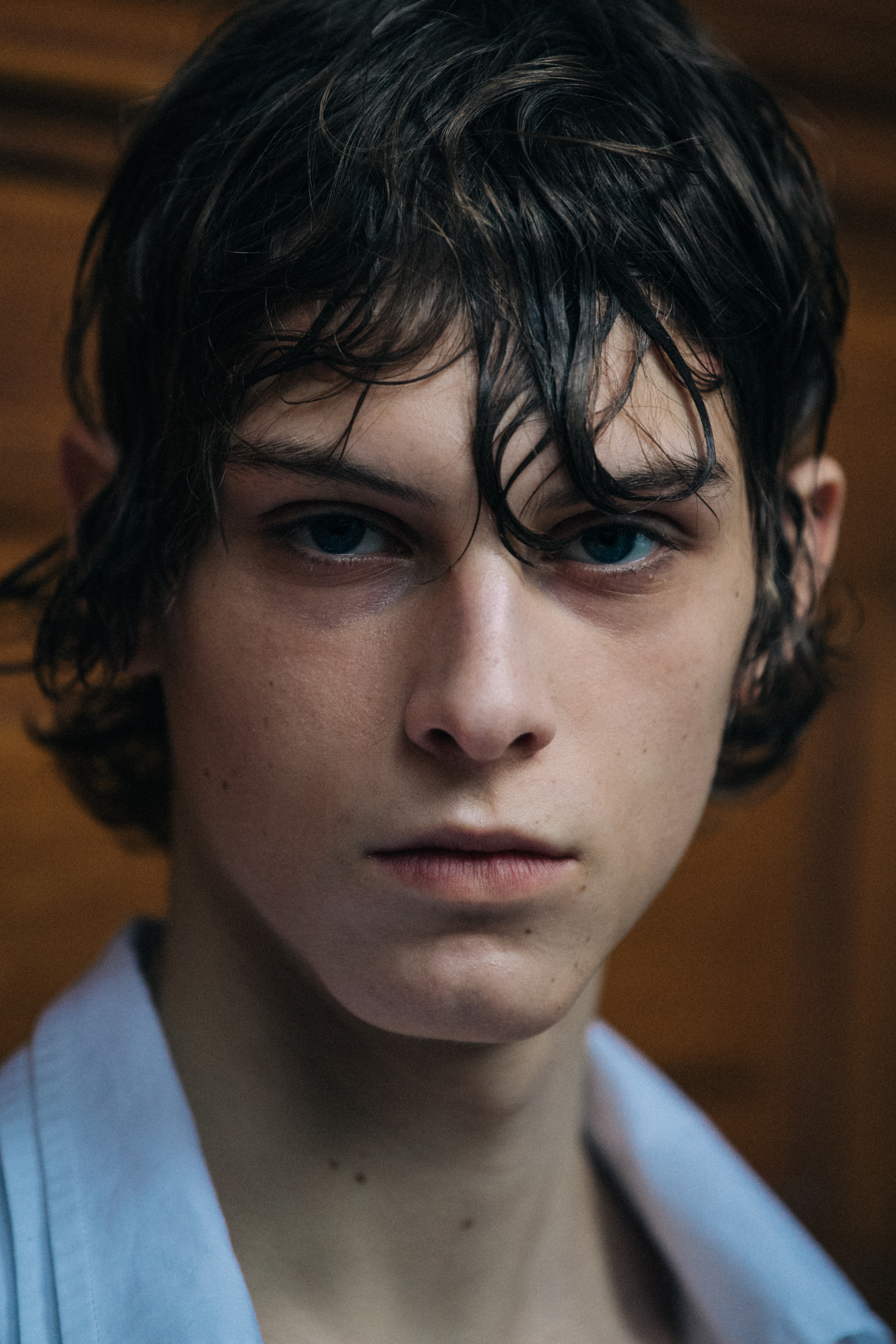 Portrait of model with long messy fringe