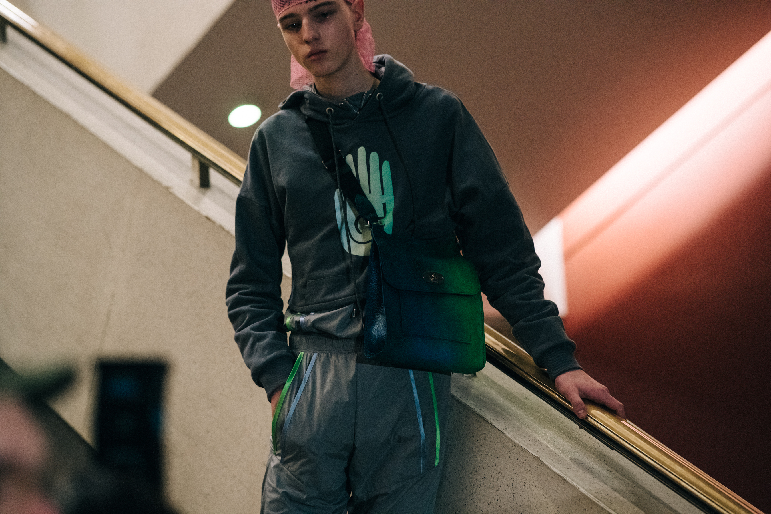 Model wearing Cottweiler jumper backstage