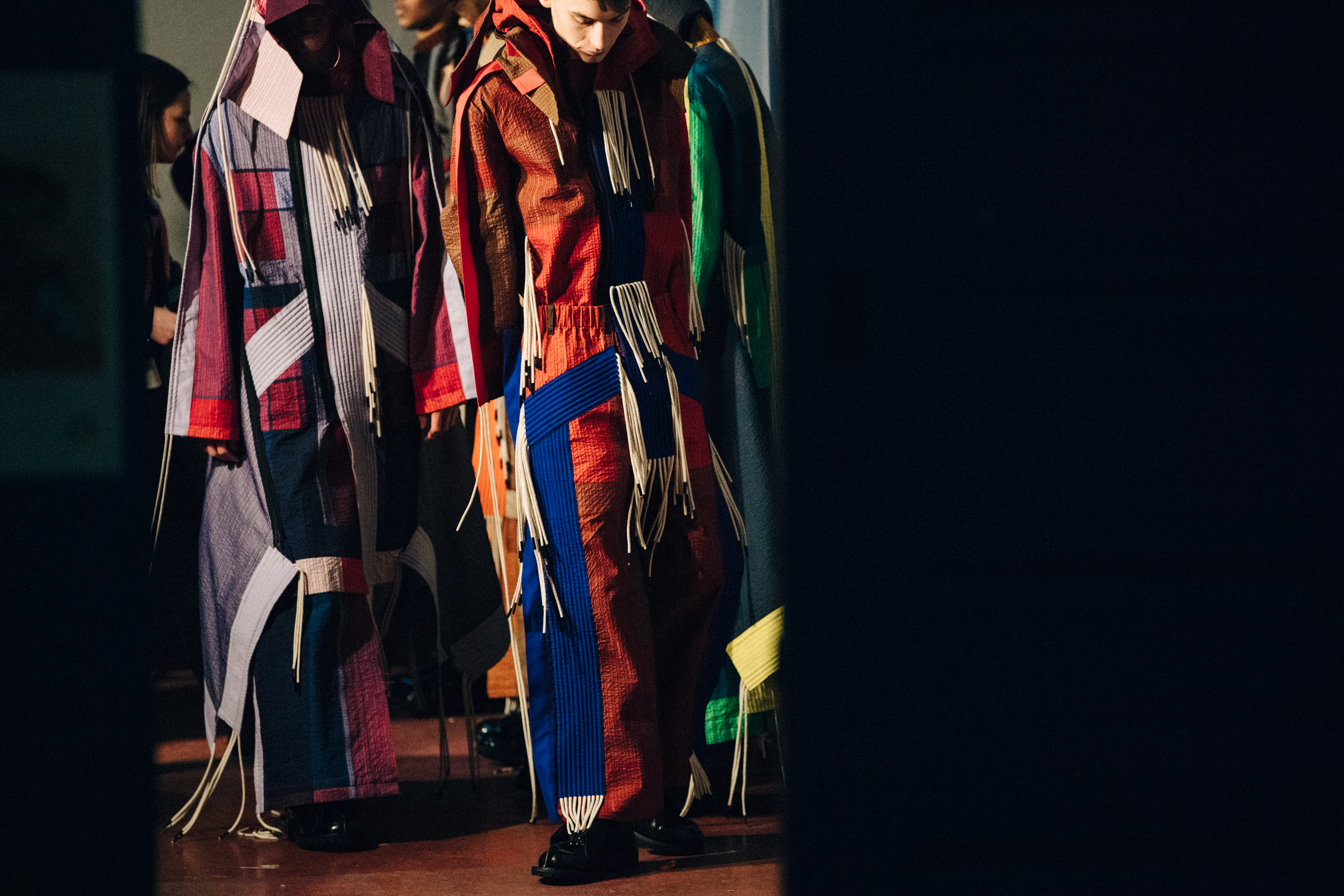Models wearing colourful Craig Green outfits