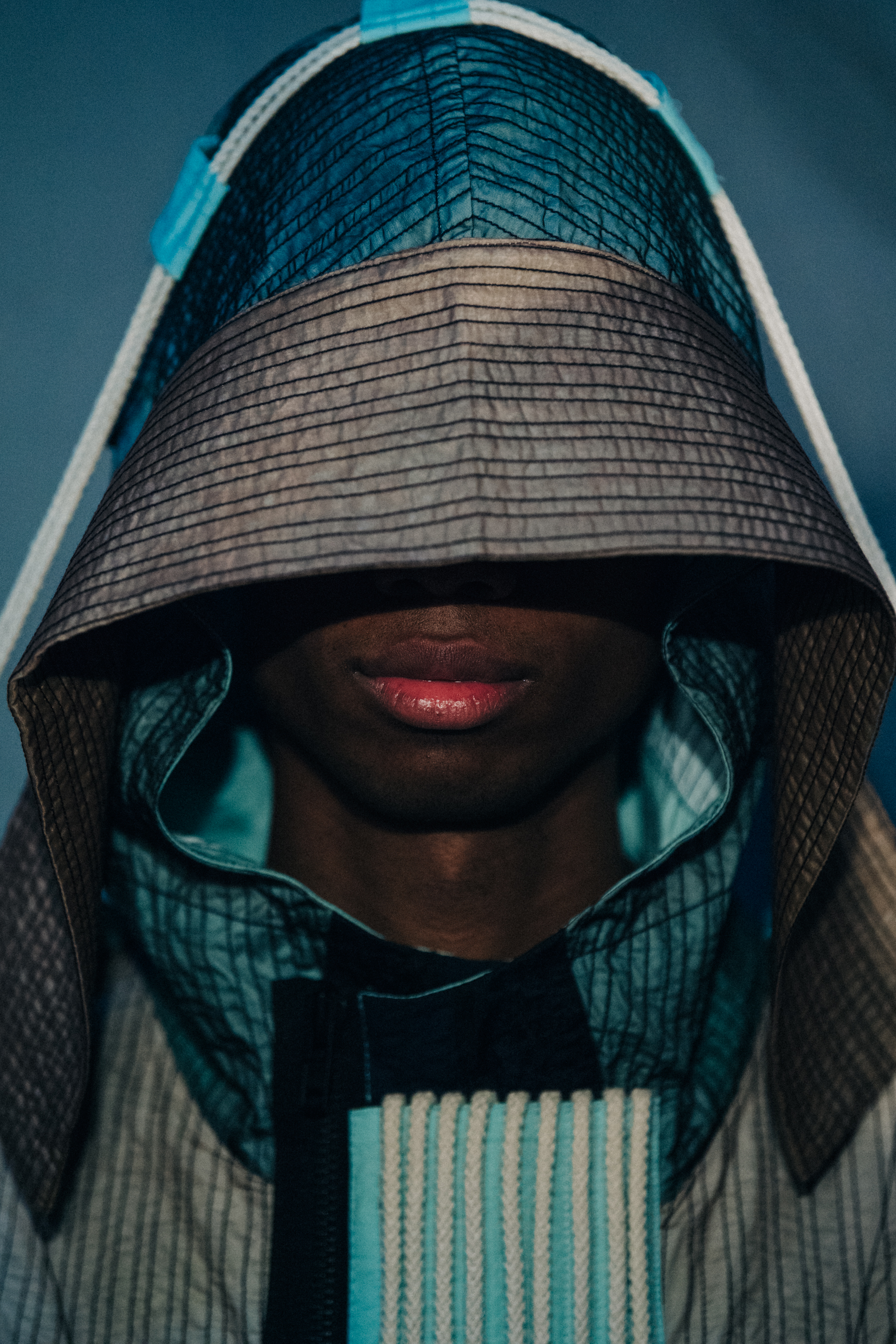 Portrait of Keiron Caynes wearing Craig Green hood