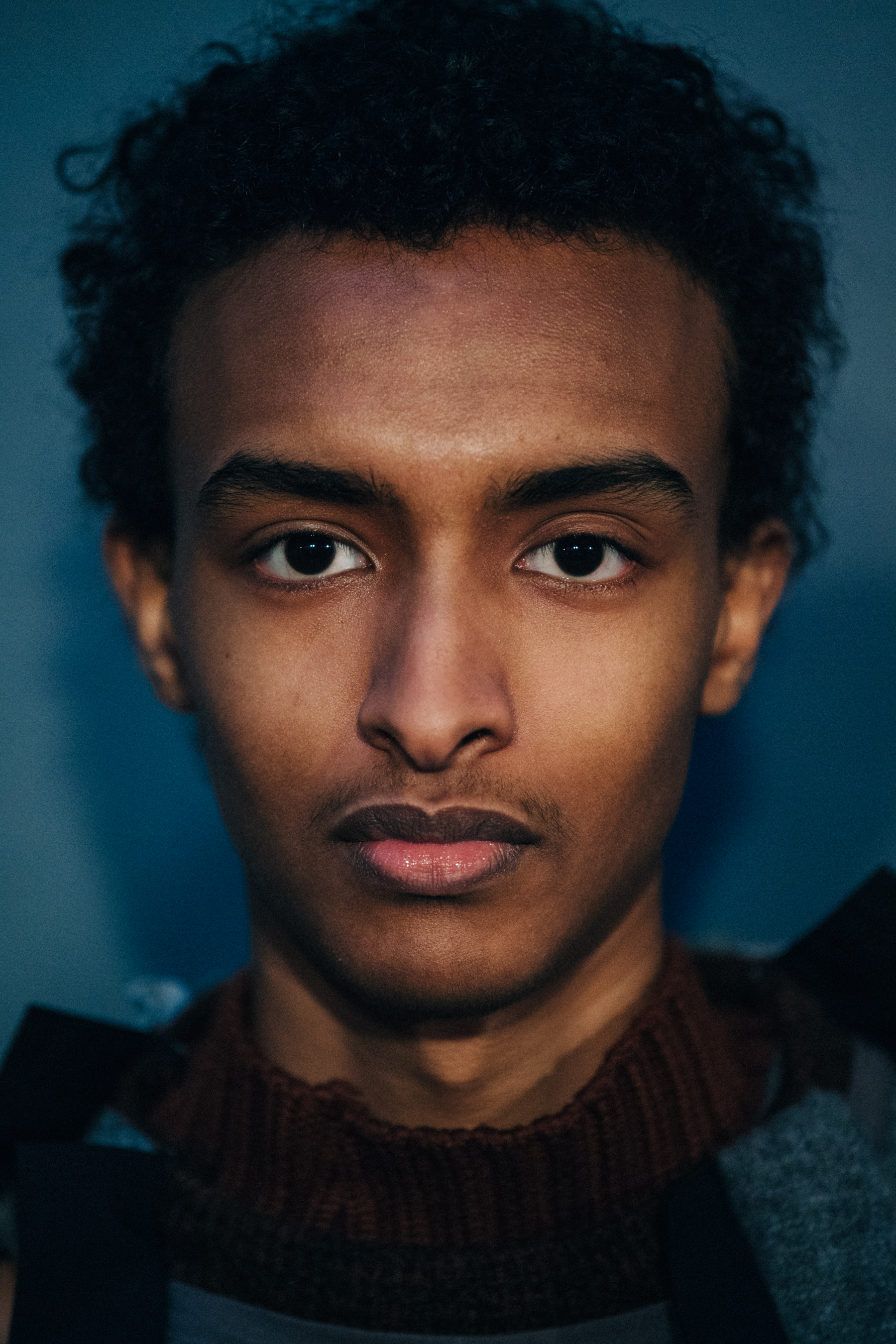 Portrait of model backstage at Craig Green