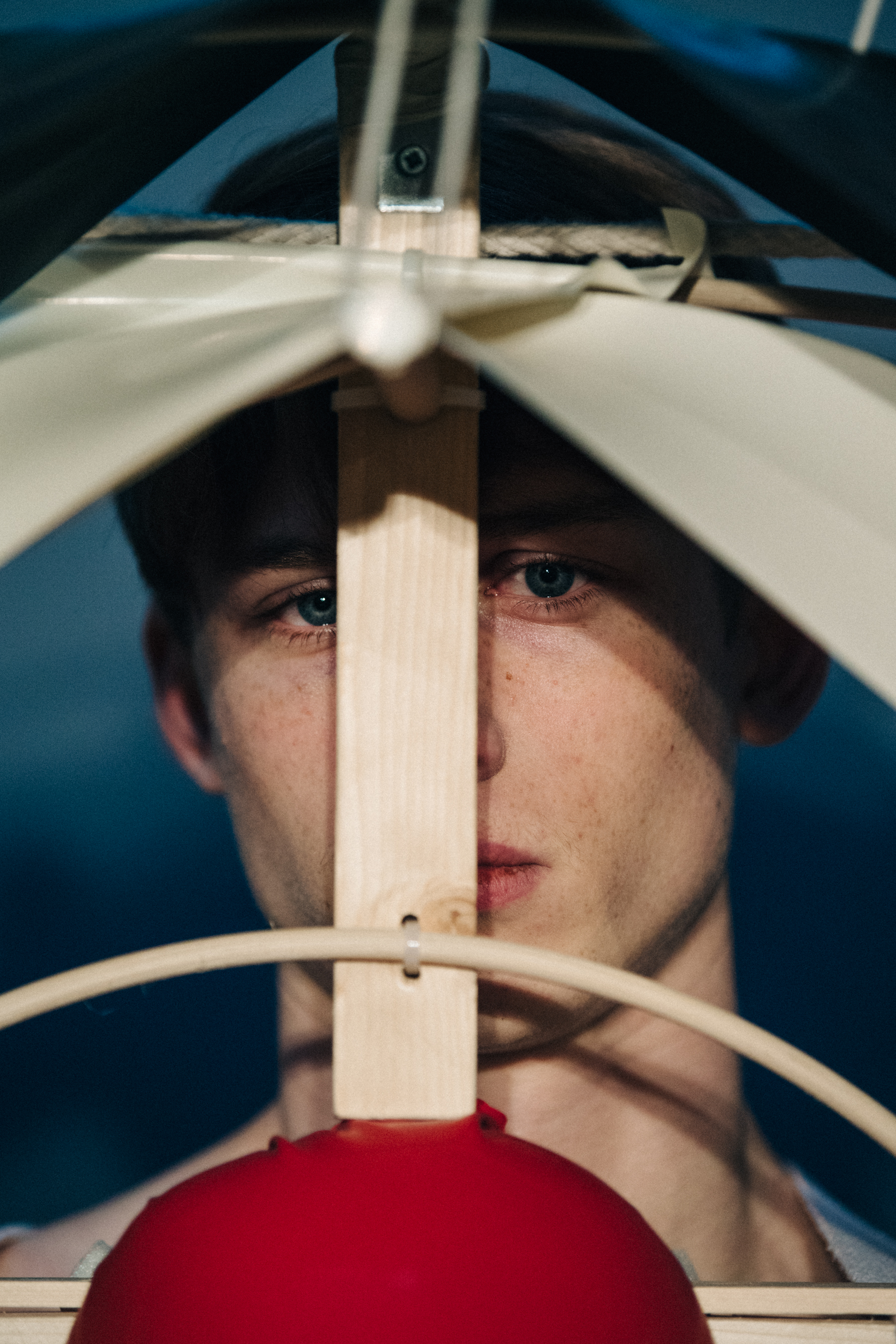 Portrait of model behind Craig Green prop
