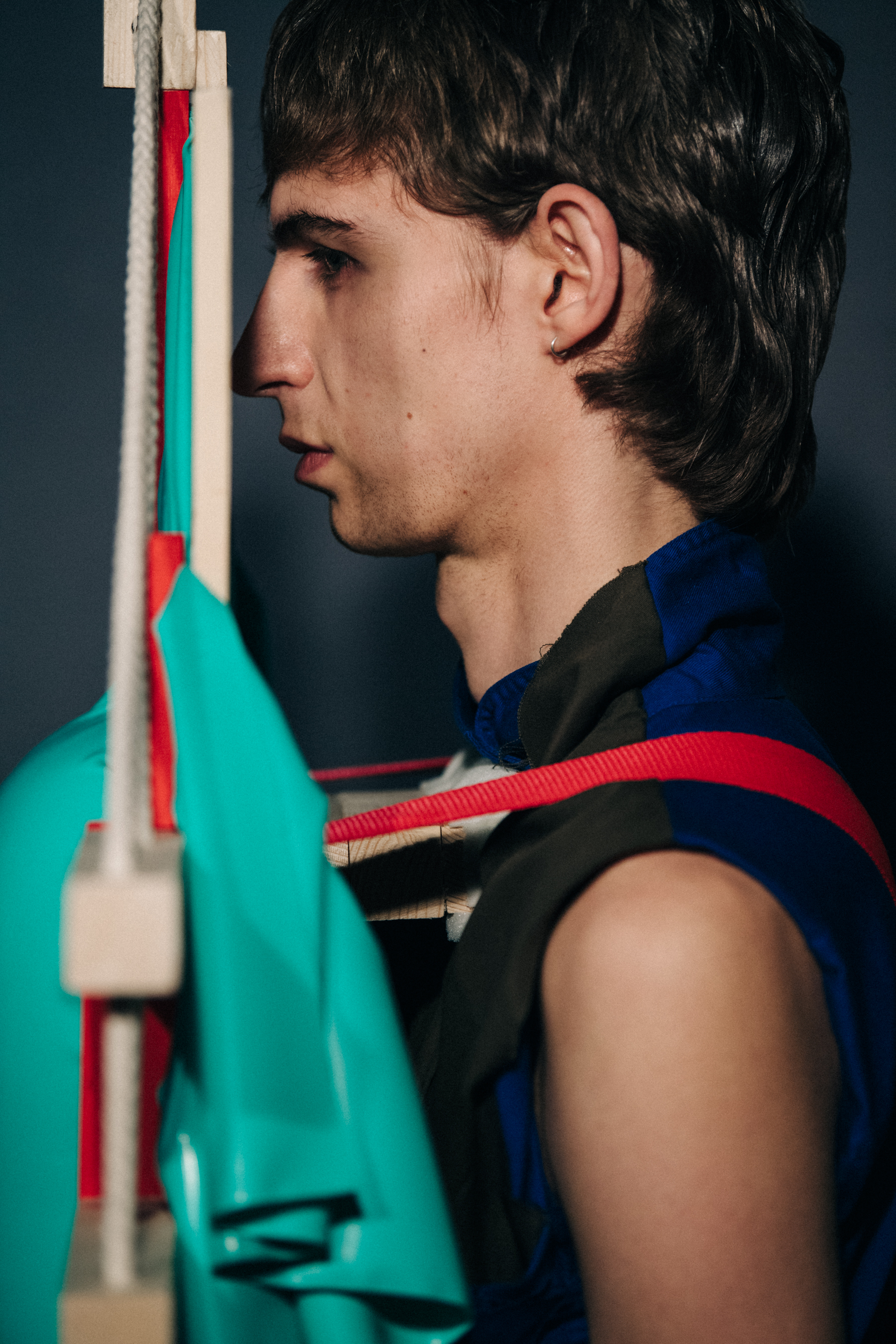 Portrait of model wearing Craig Green prop