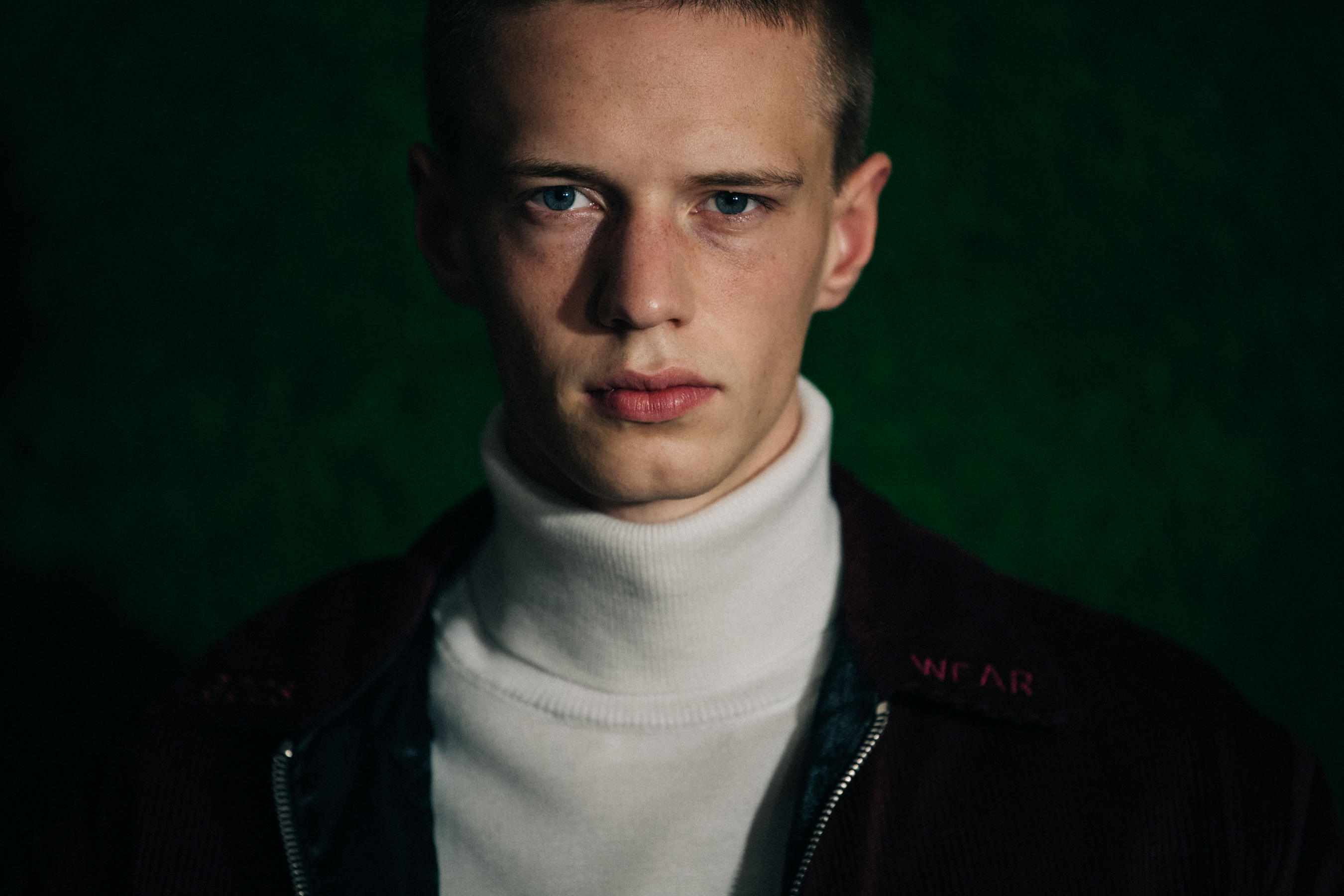 Model backstage at GCDS with blue eyes