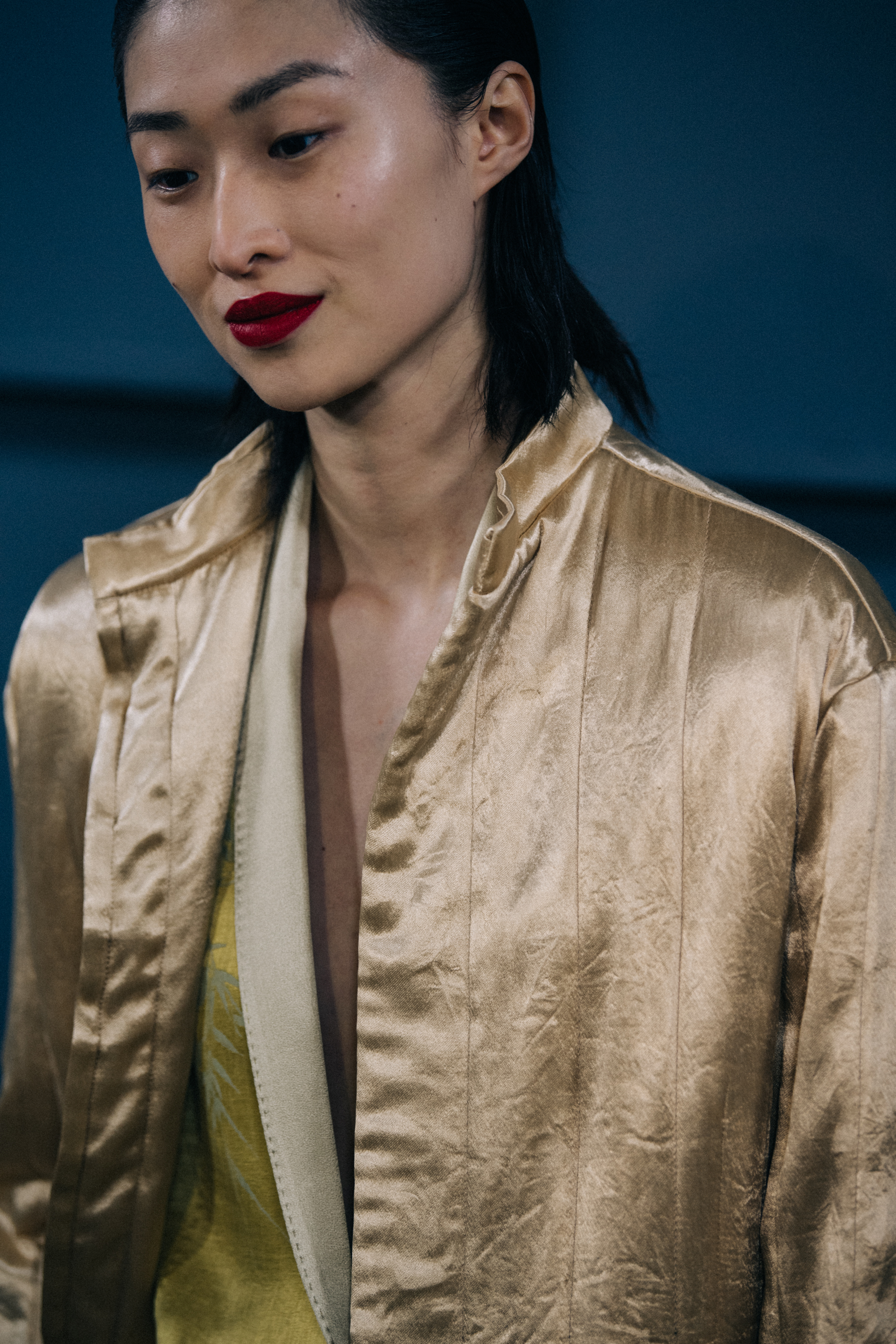 Sora Choi wearing gold at Haider Ackermann