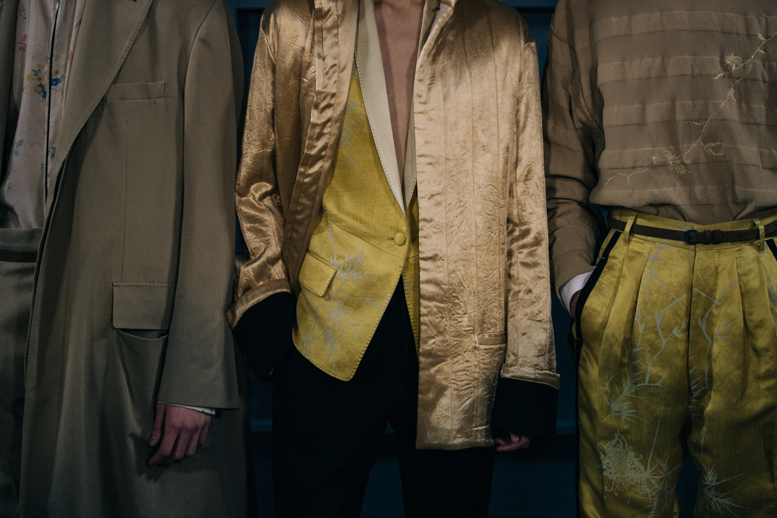 Sora Choi with models wearing gold