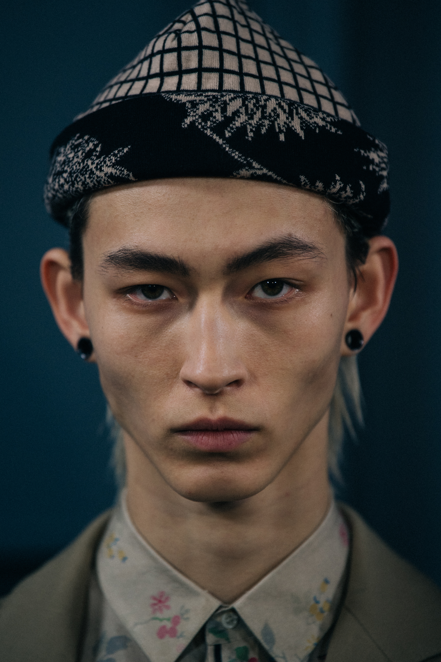 Portrait of model wearing Asian style hat