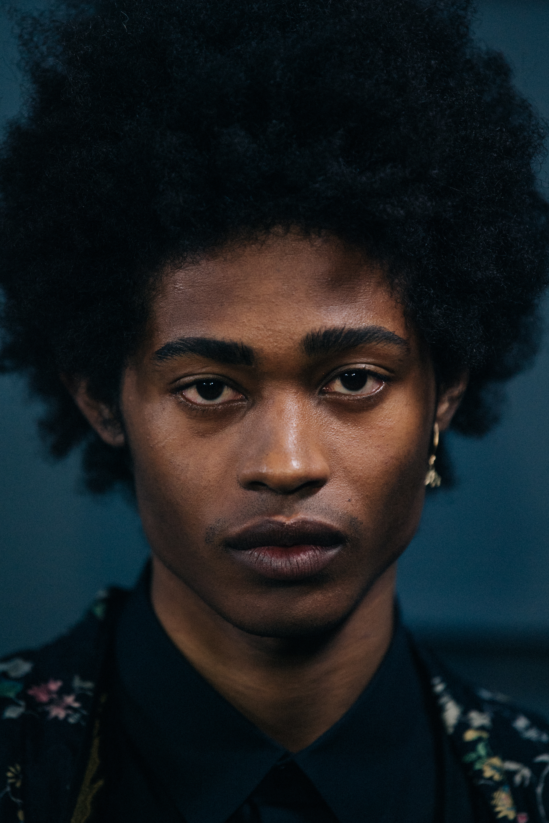 Portrait of model with thick black afro