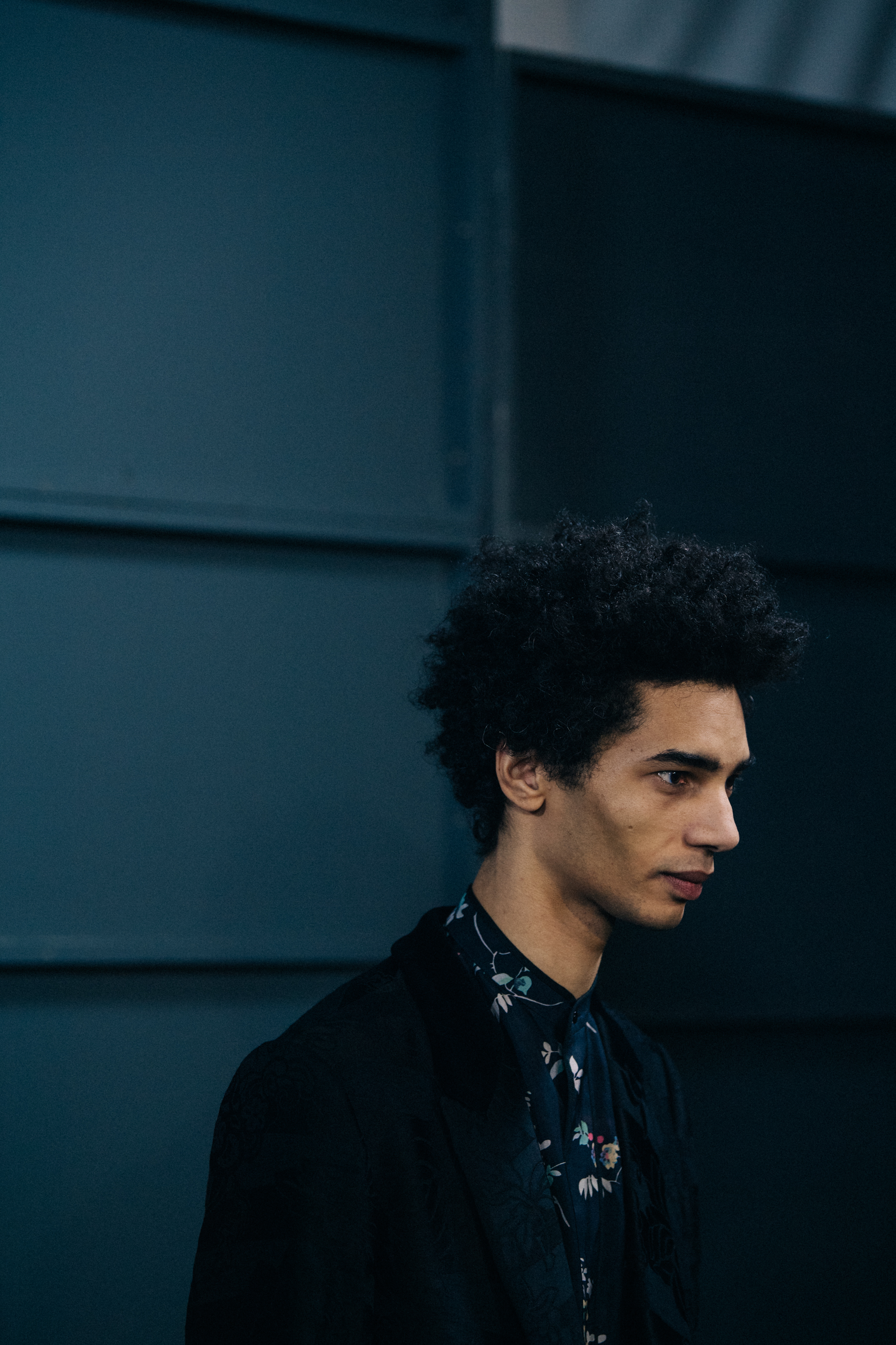 Model wearing floral shirt
