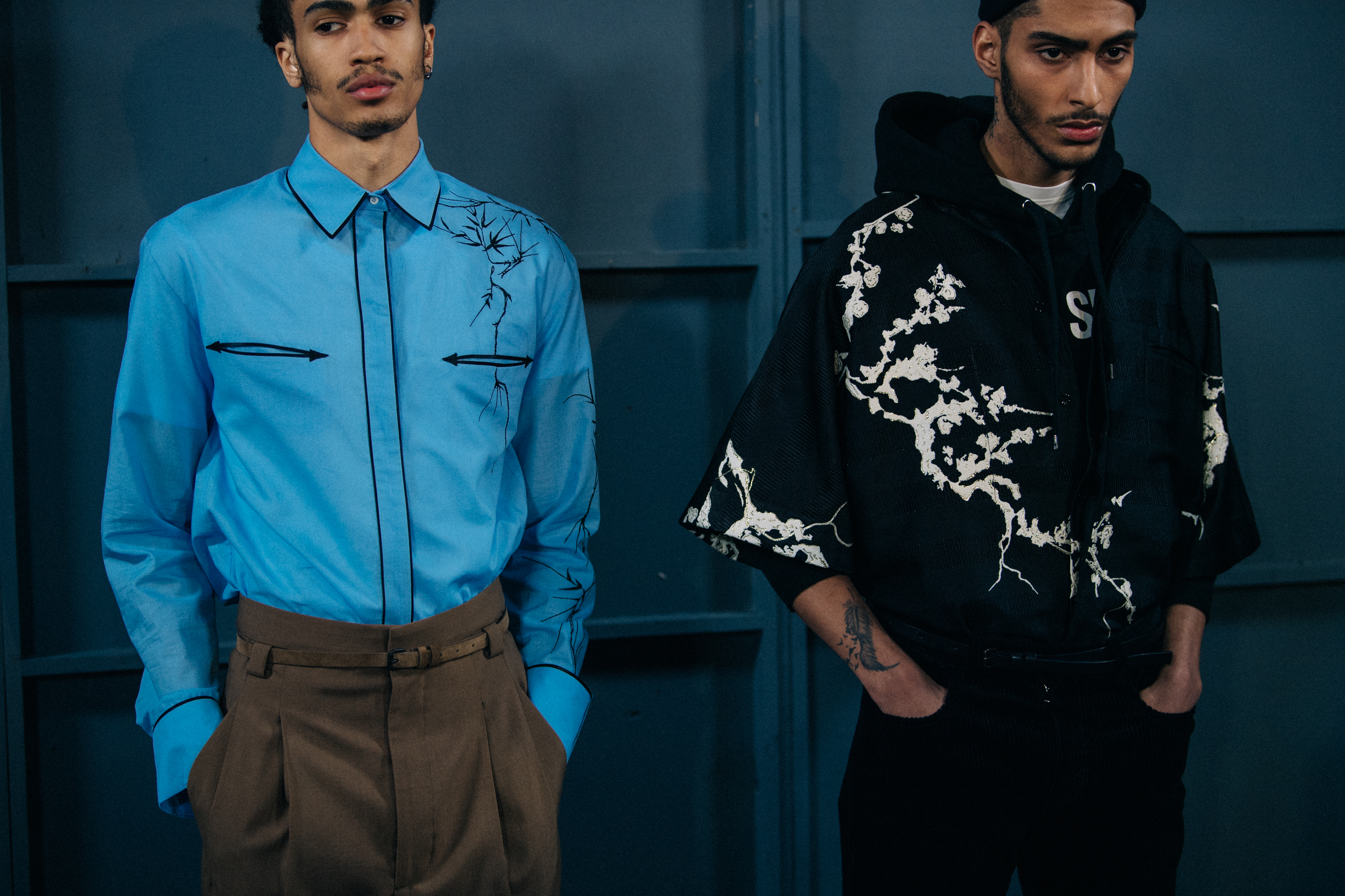 Models wearing blue and black florals