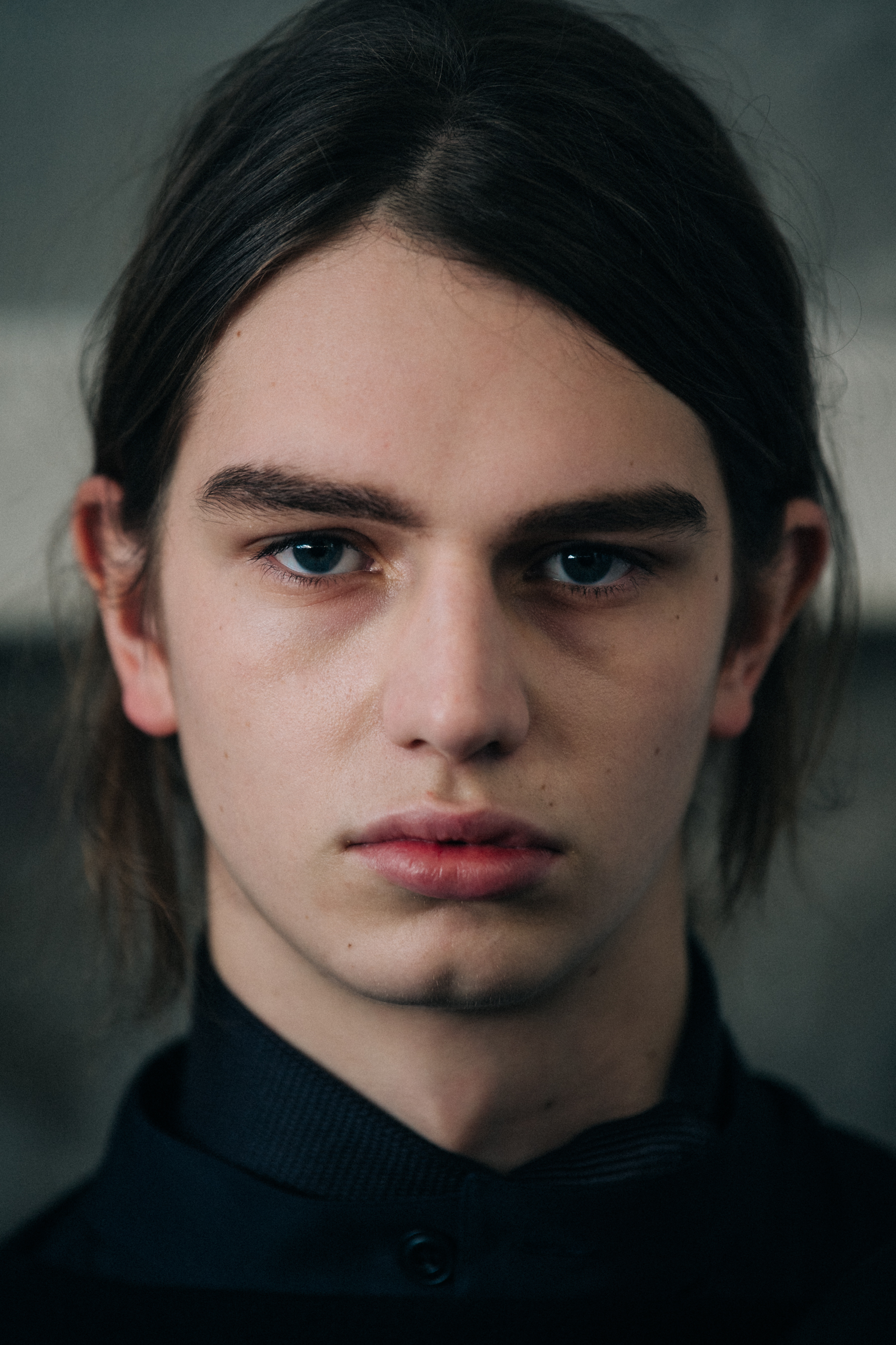 Portrait of male model backstage at Lemaire