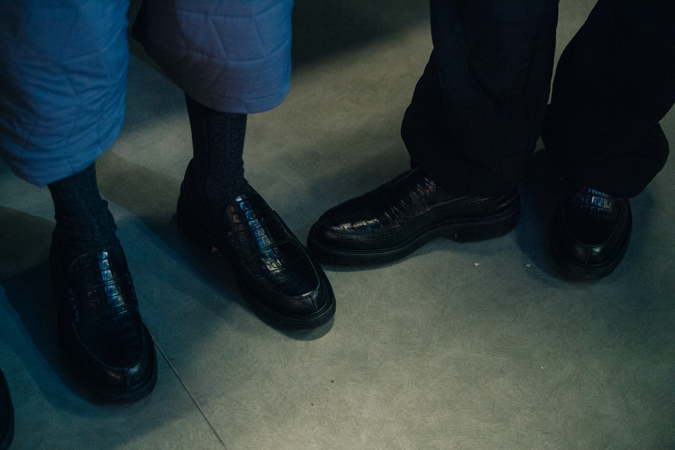Models wearing smart black shoes