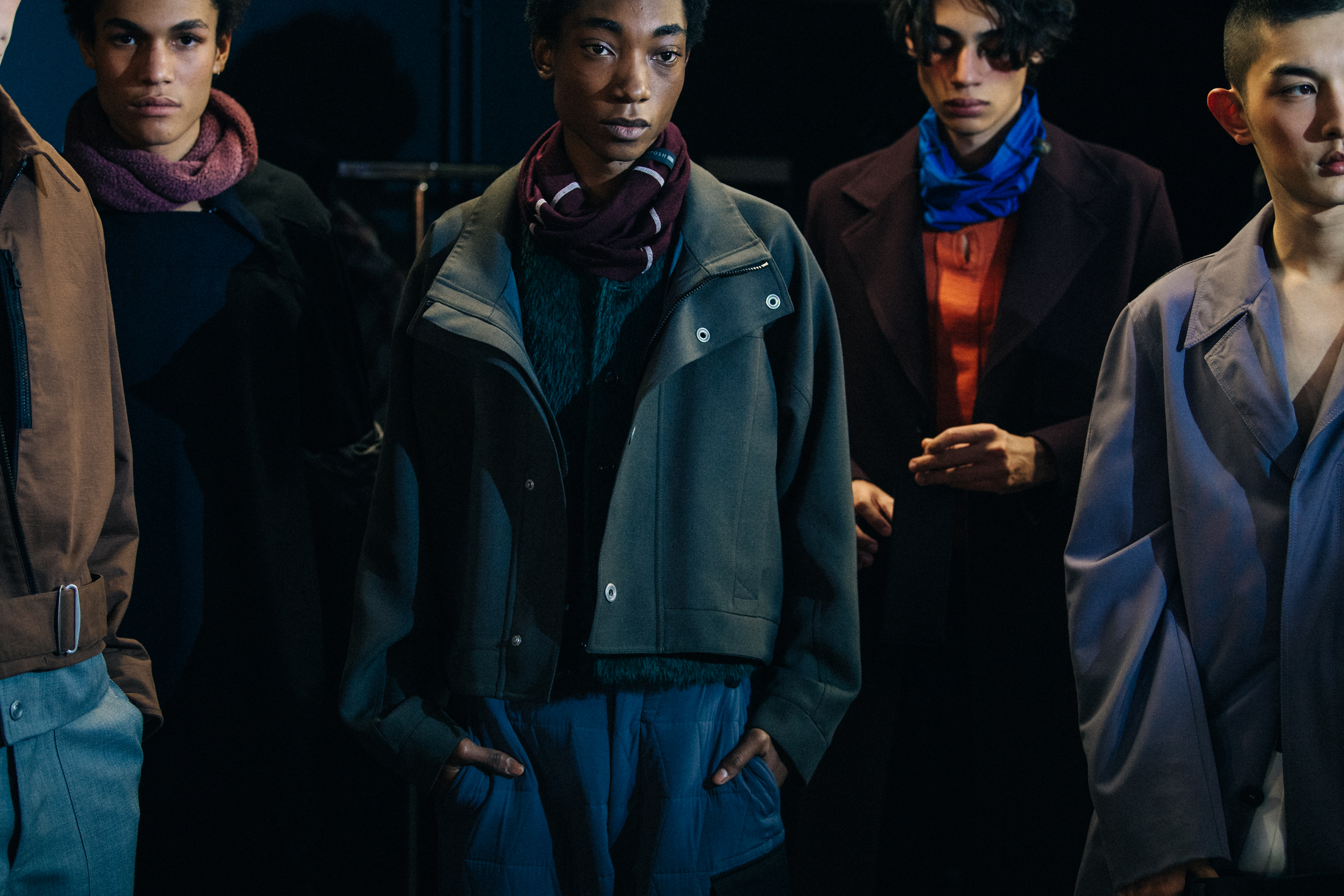 Group of models wearing MACKINTOSH 0003 outfits