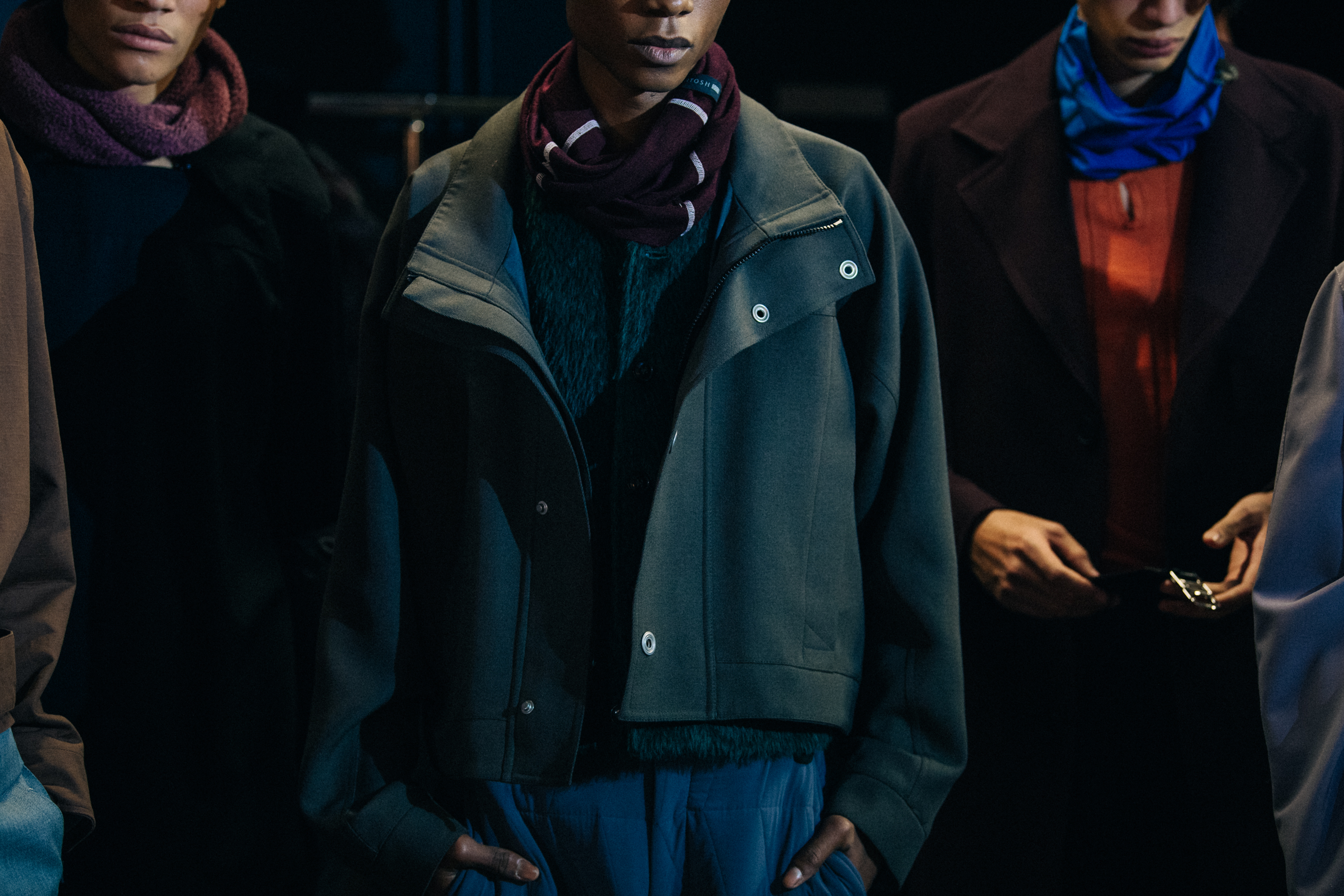 Group of models wearing MACKINTOSH 0003 outfits