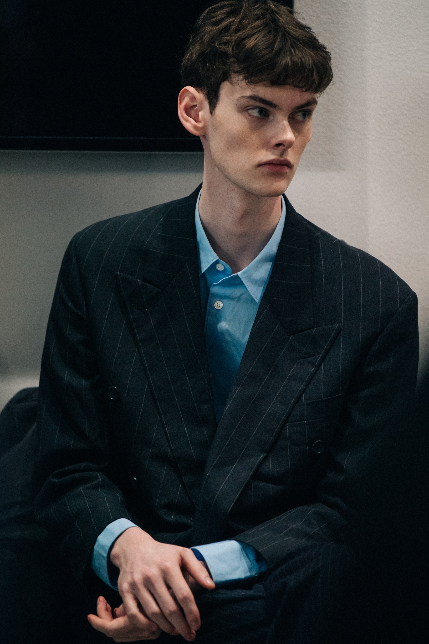 Ricky Graham backstage wearing dark suit