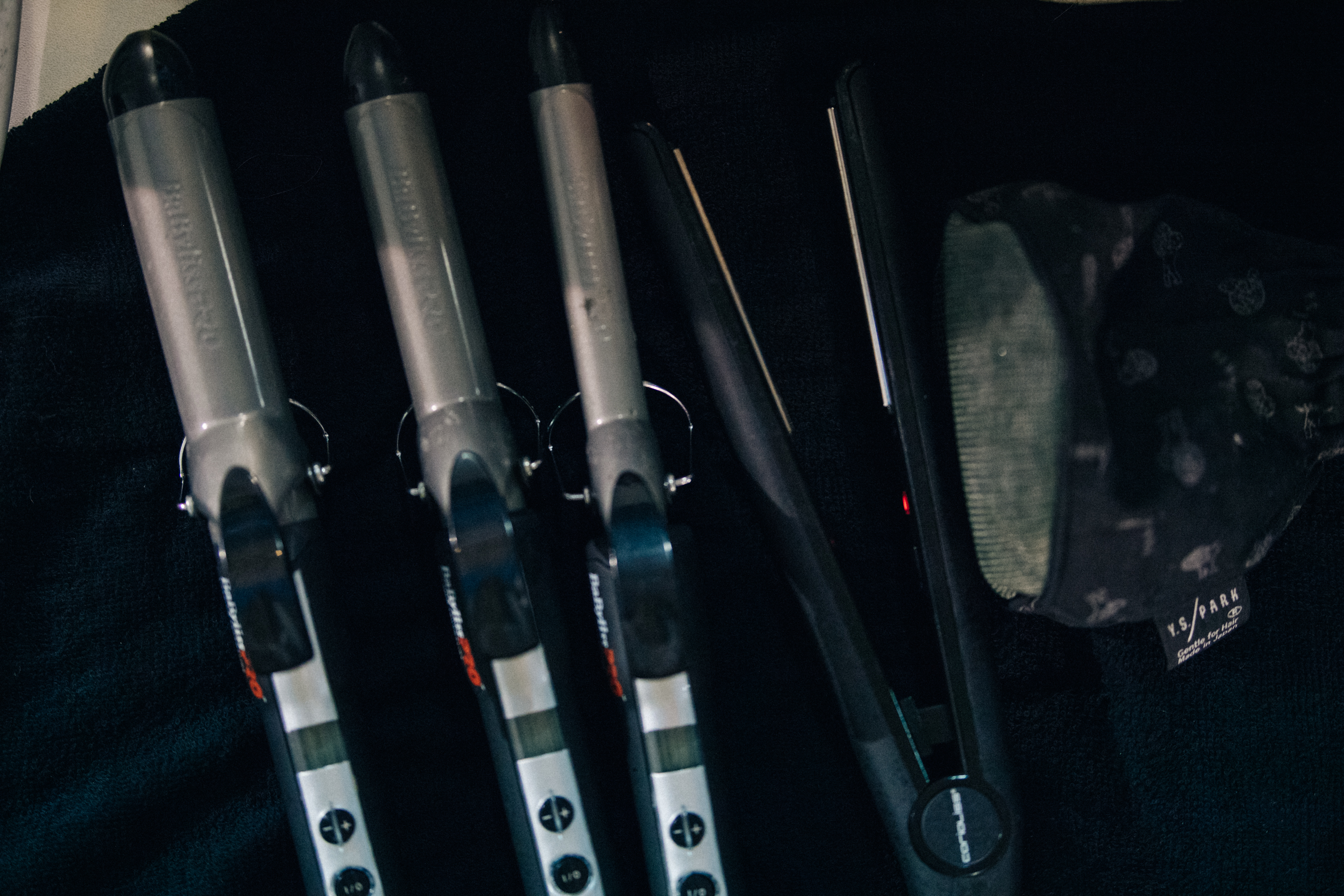 Hair curling tongs backstage