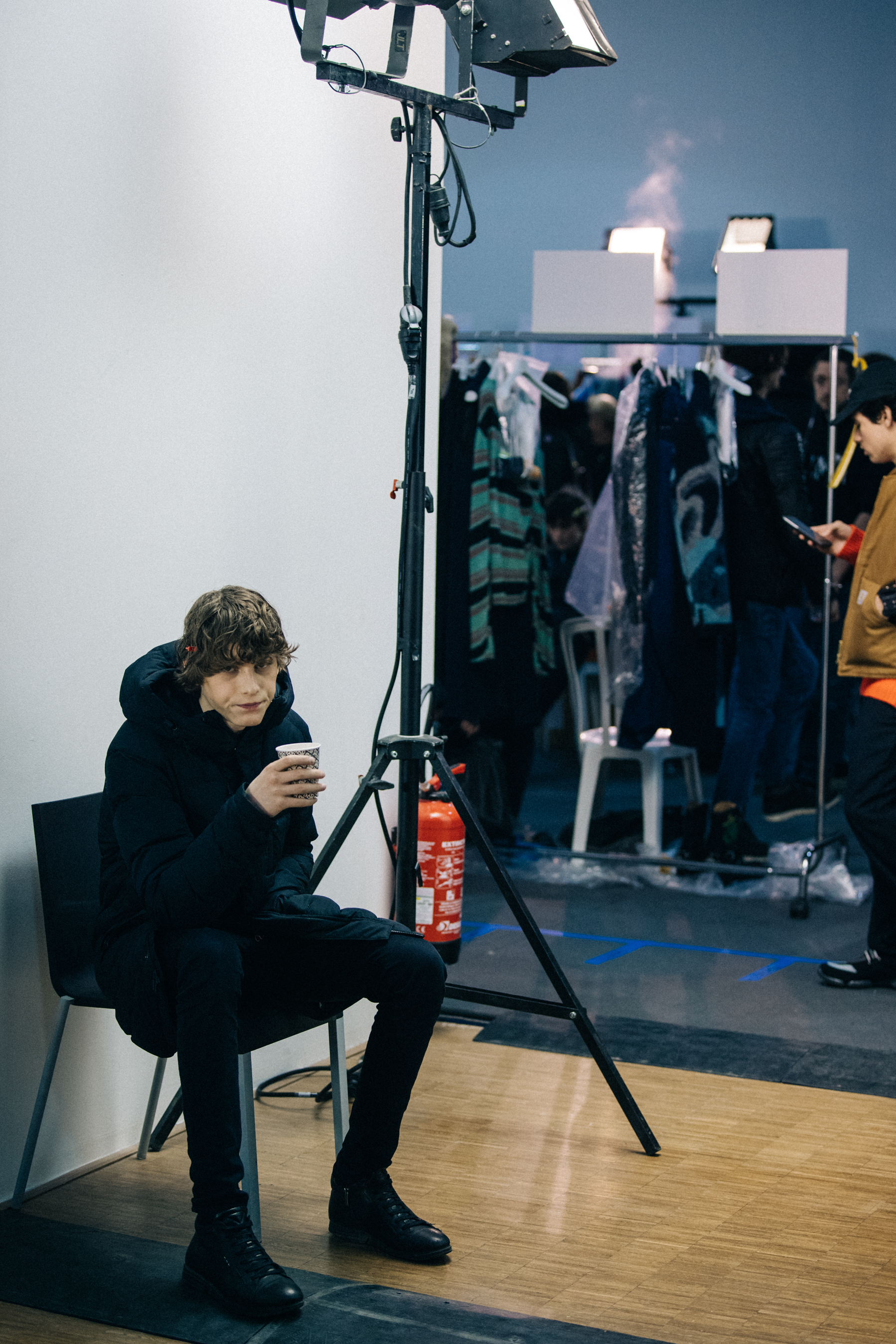 Model waiting backstage in preparation