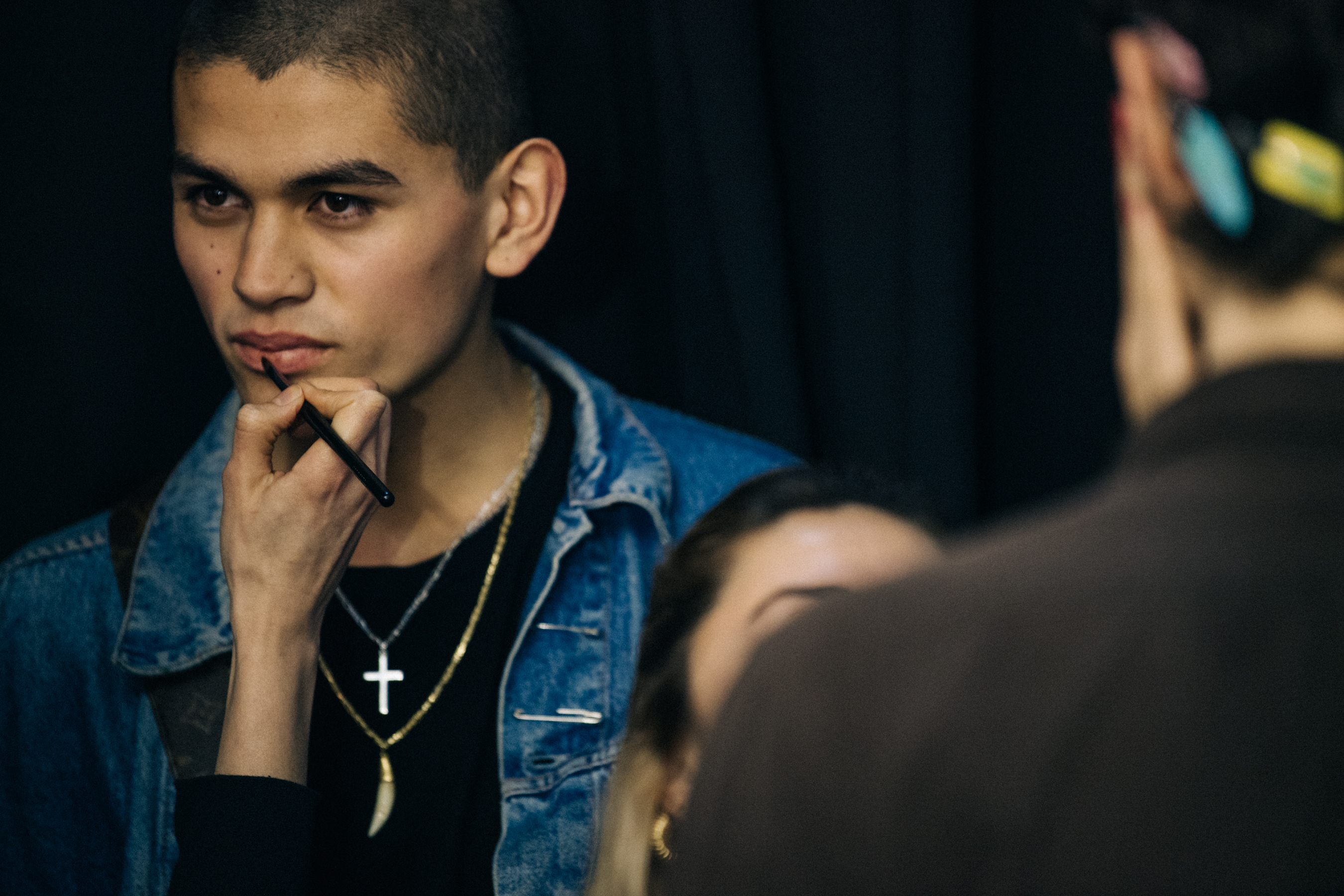 Model waiting backstage in preparation