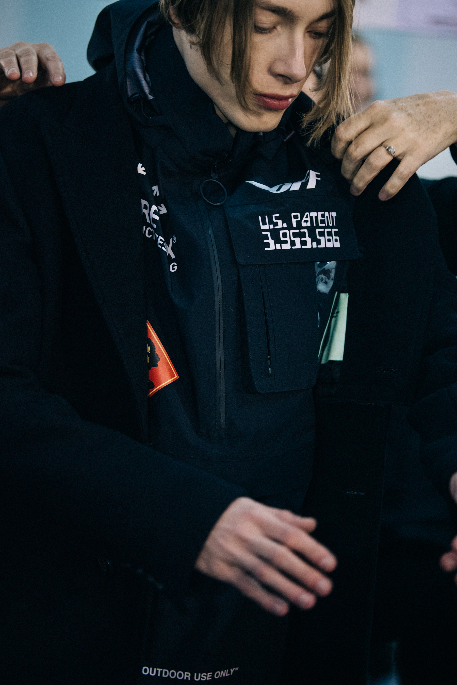 Models dressing backstage at Off-White