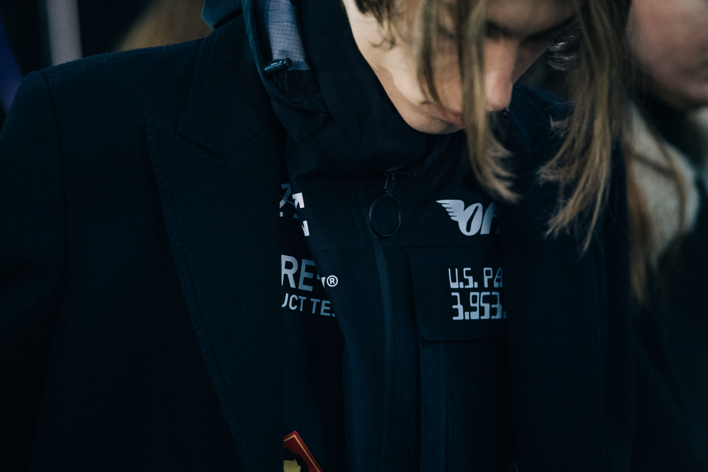 Models dressing backstage at Off-White