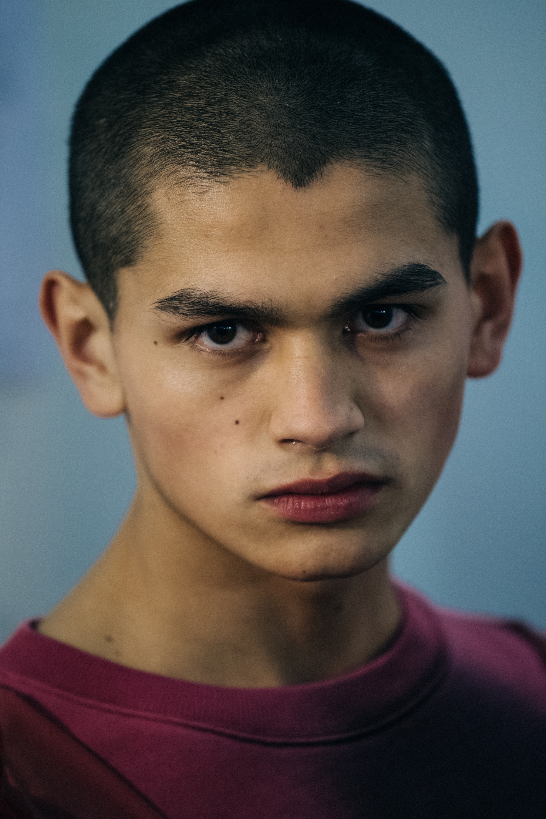Portrait of male model with shaved head
