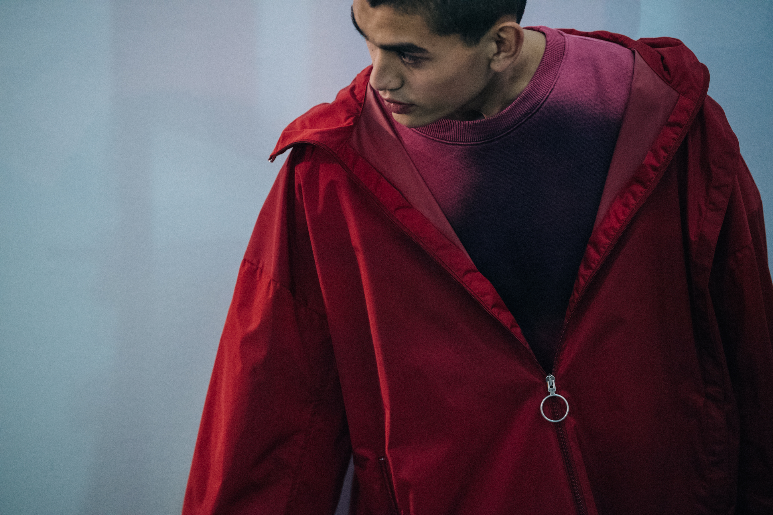 Model wearing red Off-White jacket