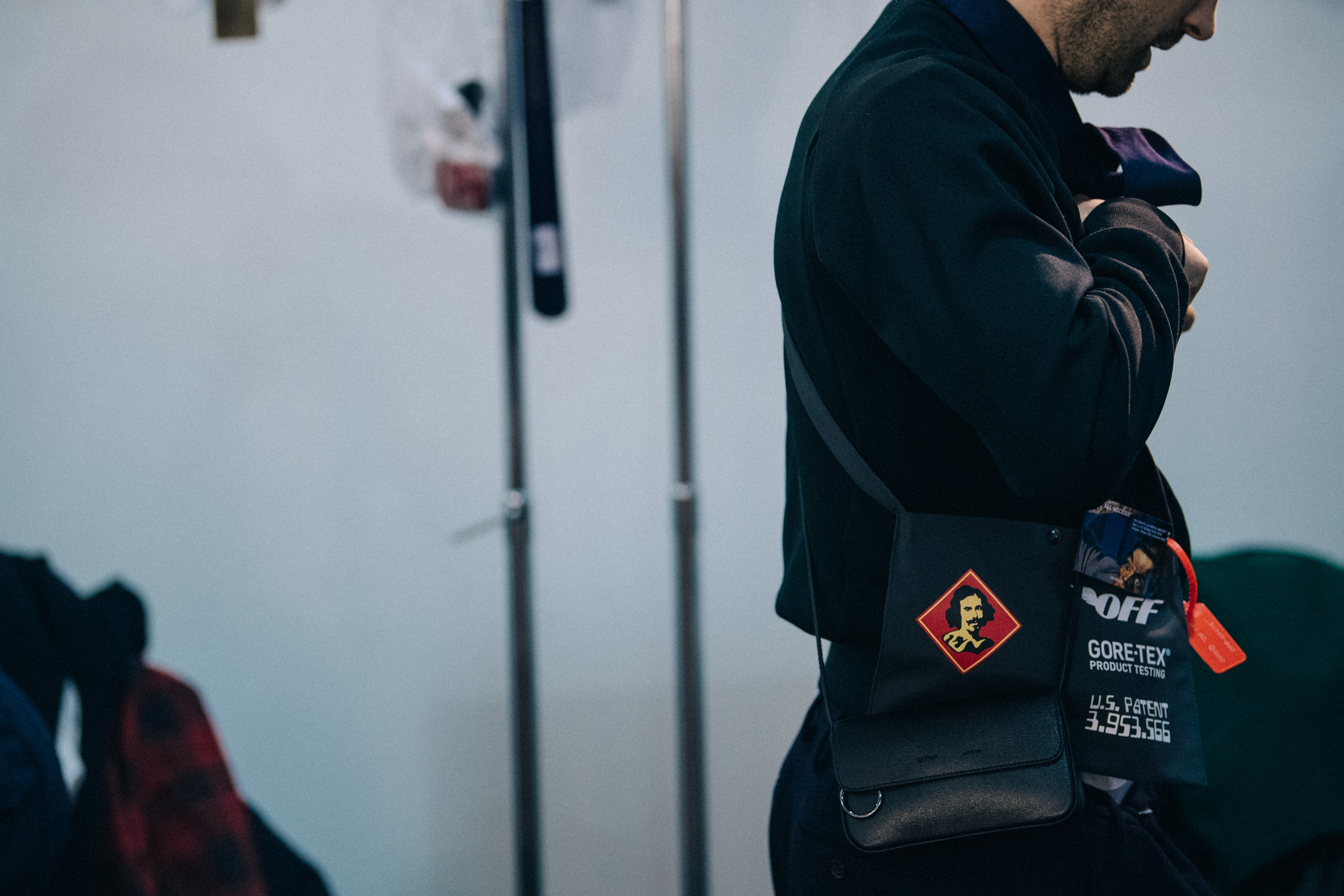 Man carrying Off-White bags