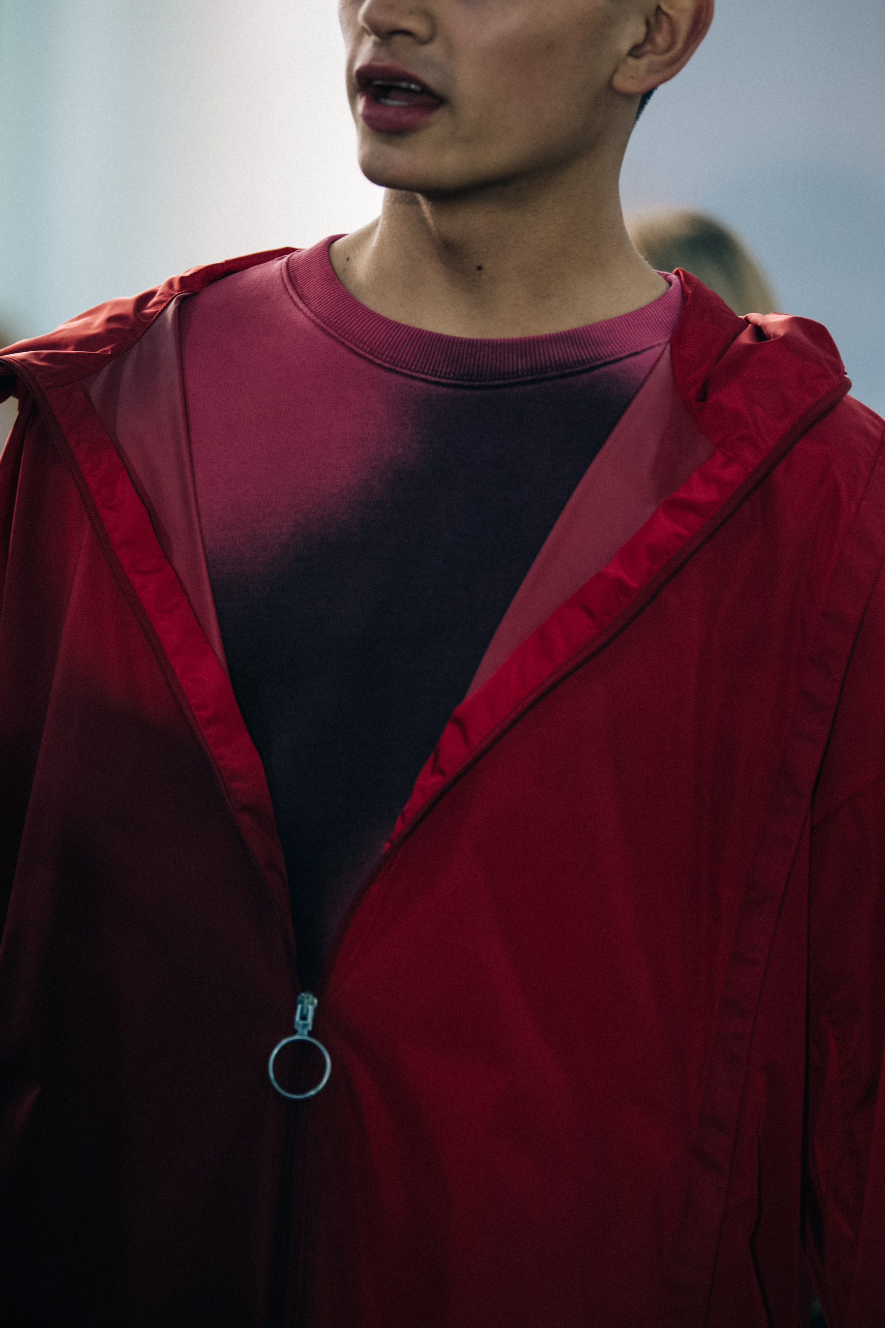 Model wearing red Off-White jacket