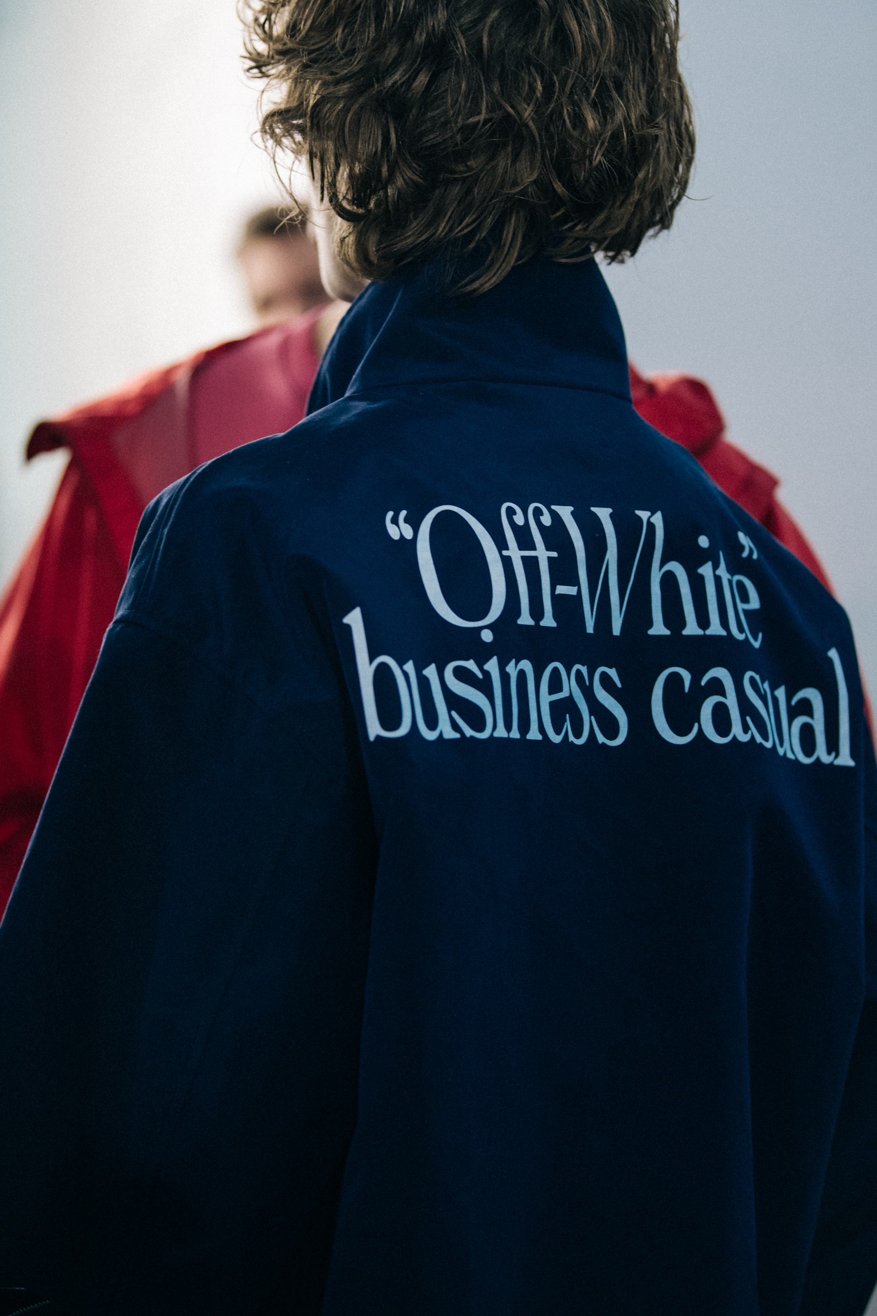 Model wearing blue Off-White jacket
