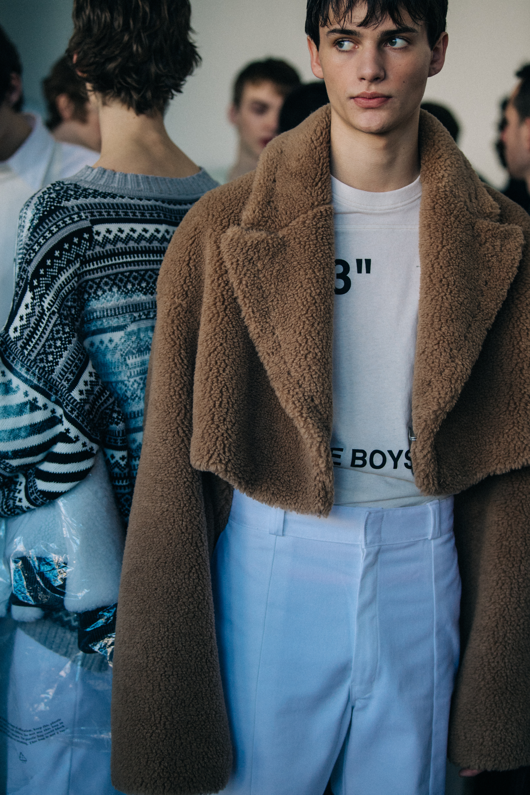 Model wearing brown fur coat