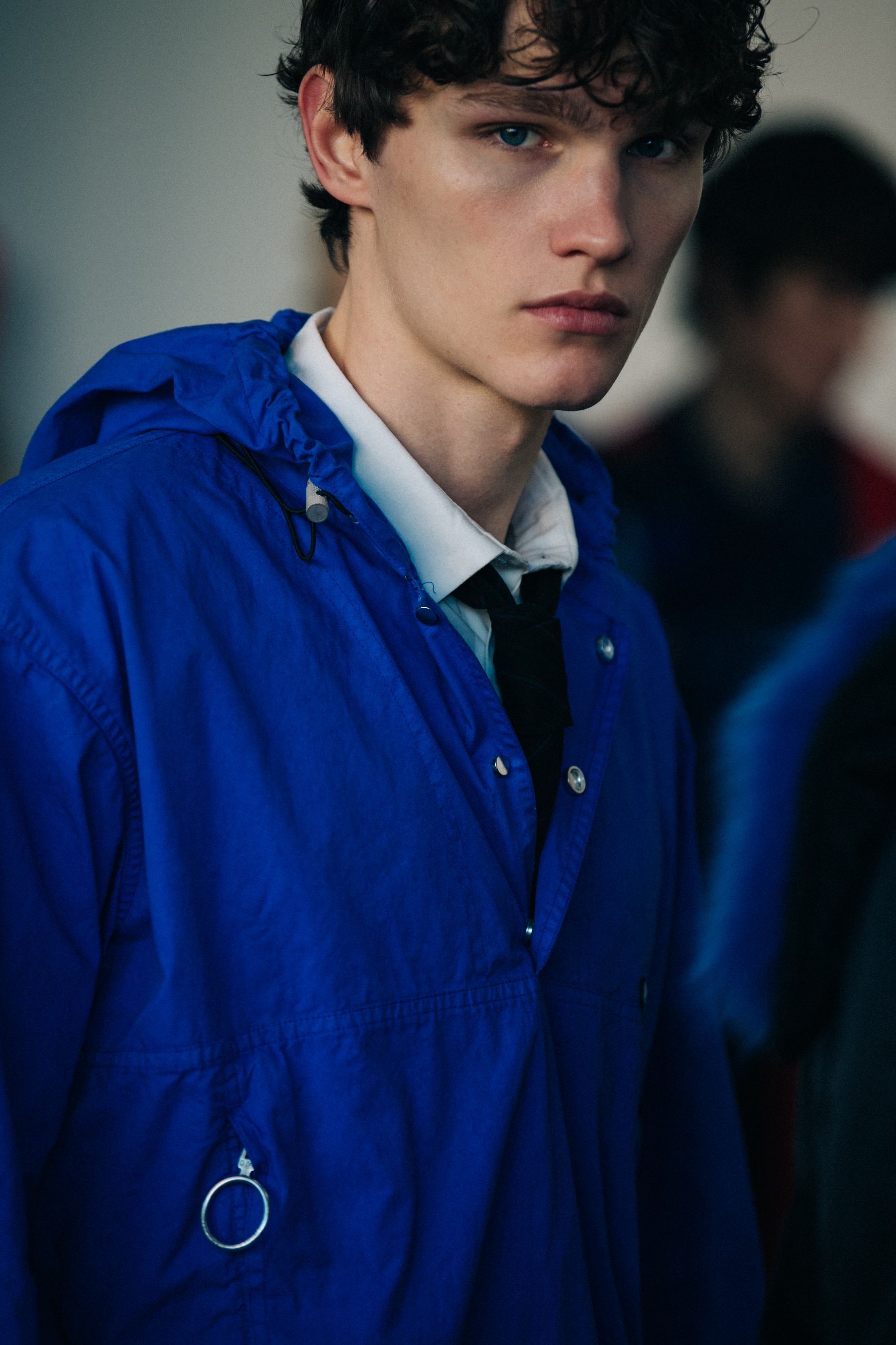 Model wearing blue Off-White jacket