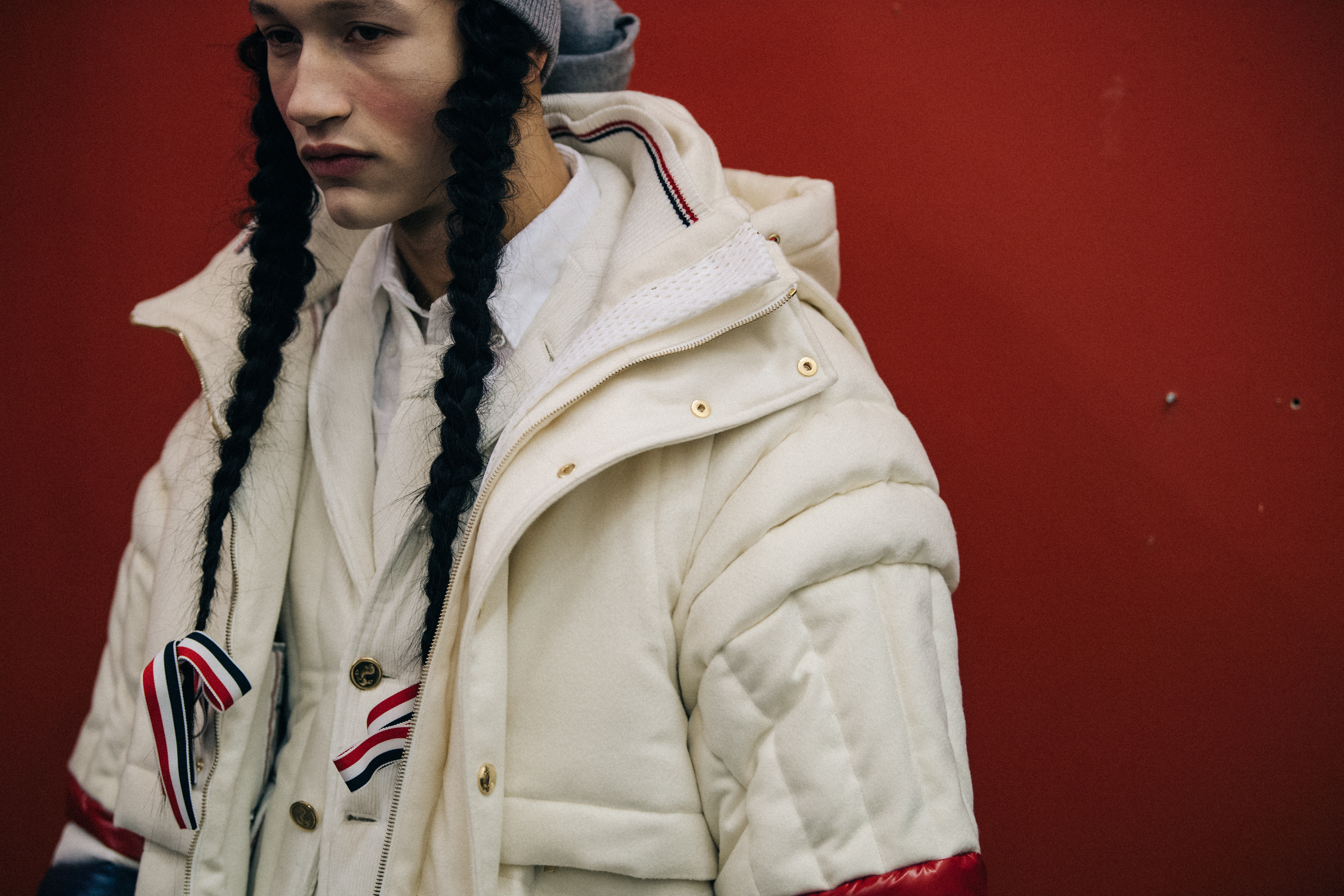 Model wearing white Thom Browne outfit