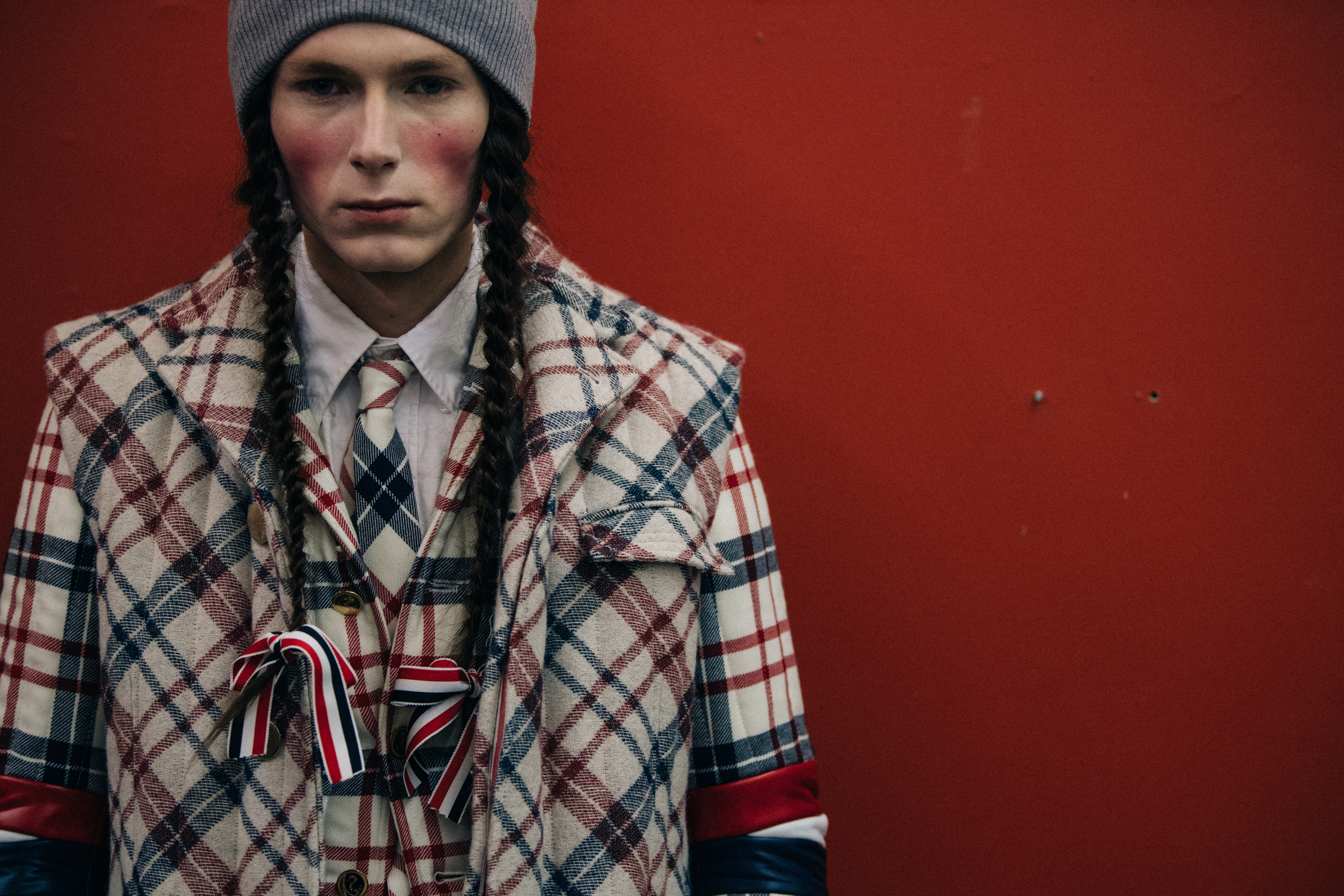 Mikhail Tsinchenko wearing Thom Browne check suit