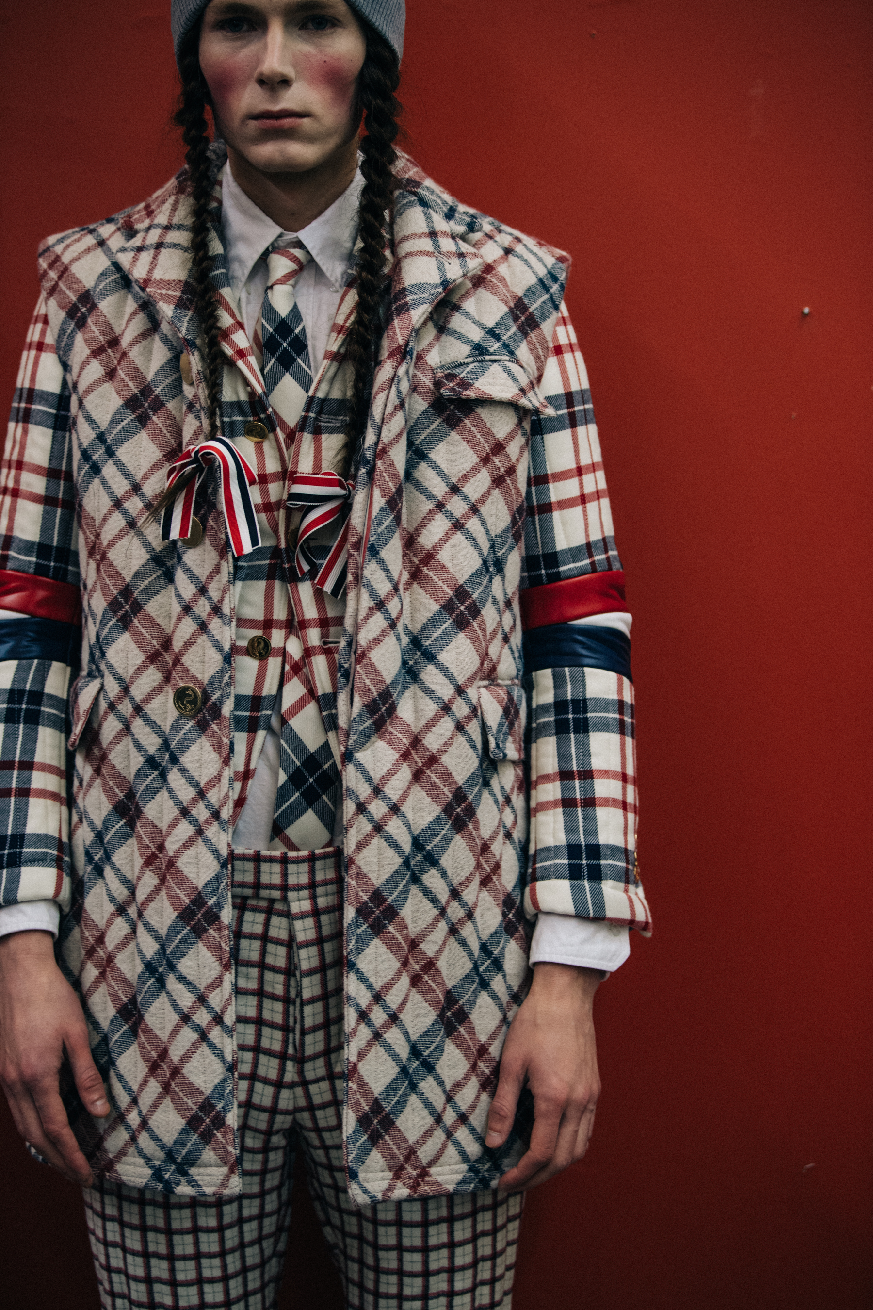 Mikhail Tsinchenko wearing Thom Browne check suit